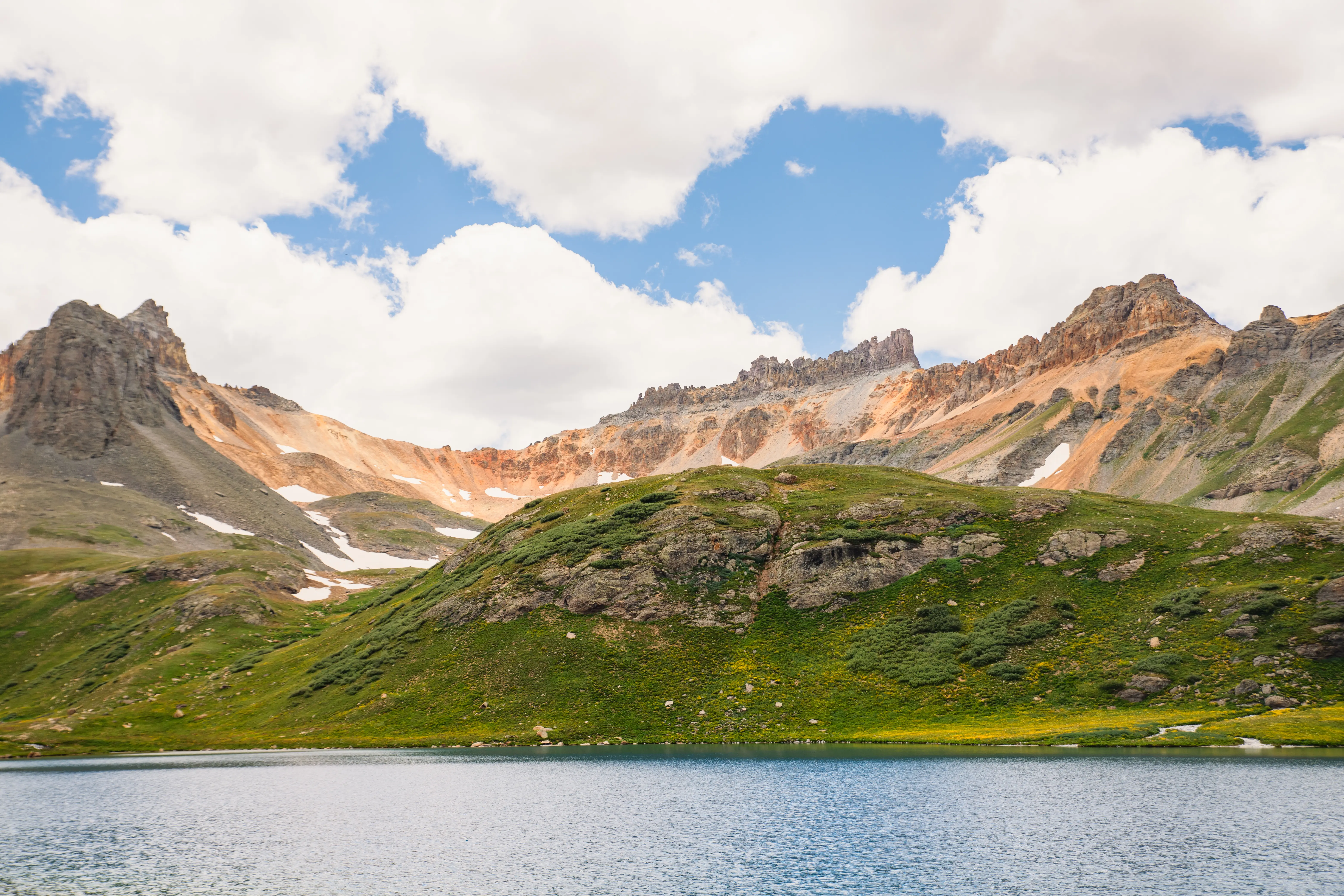 Streetside billboard with flyposters of the Batch.Works brand and illustrations