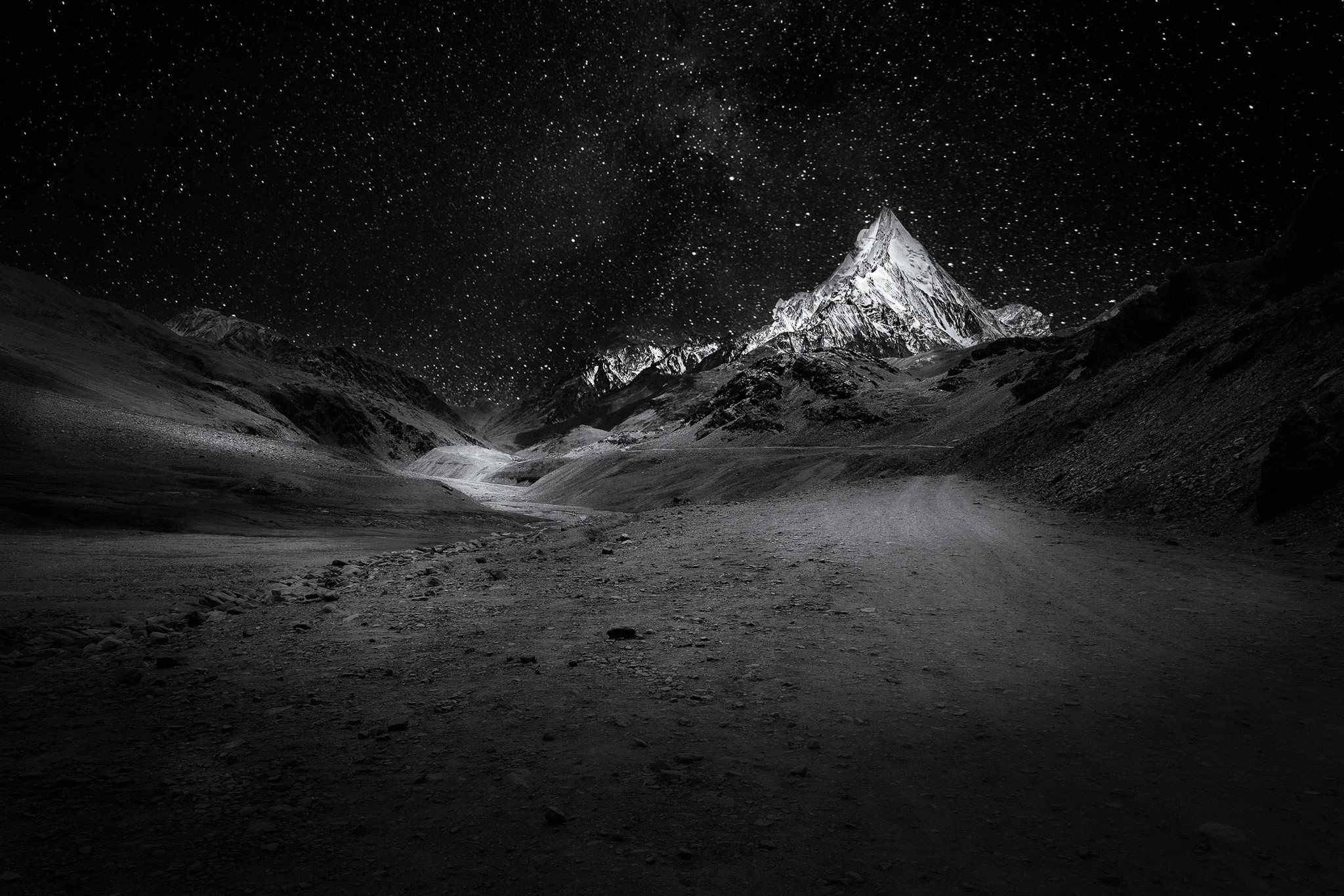 Colorful canyon formation with bright light opening at the top