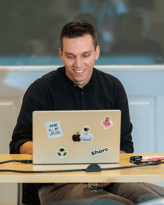 Supercharge Design team giving talks, mentoring, and connecting with the design community at conferences and workshops