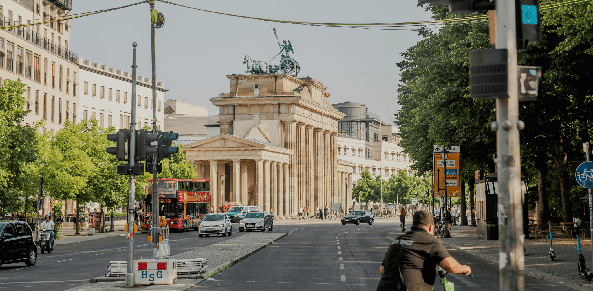 a person riding a skateboard down a street
