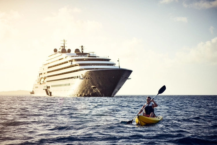 Paddleboarding outside of yacht