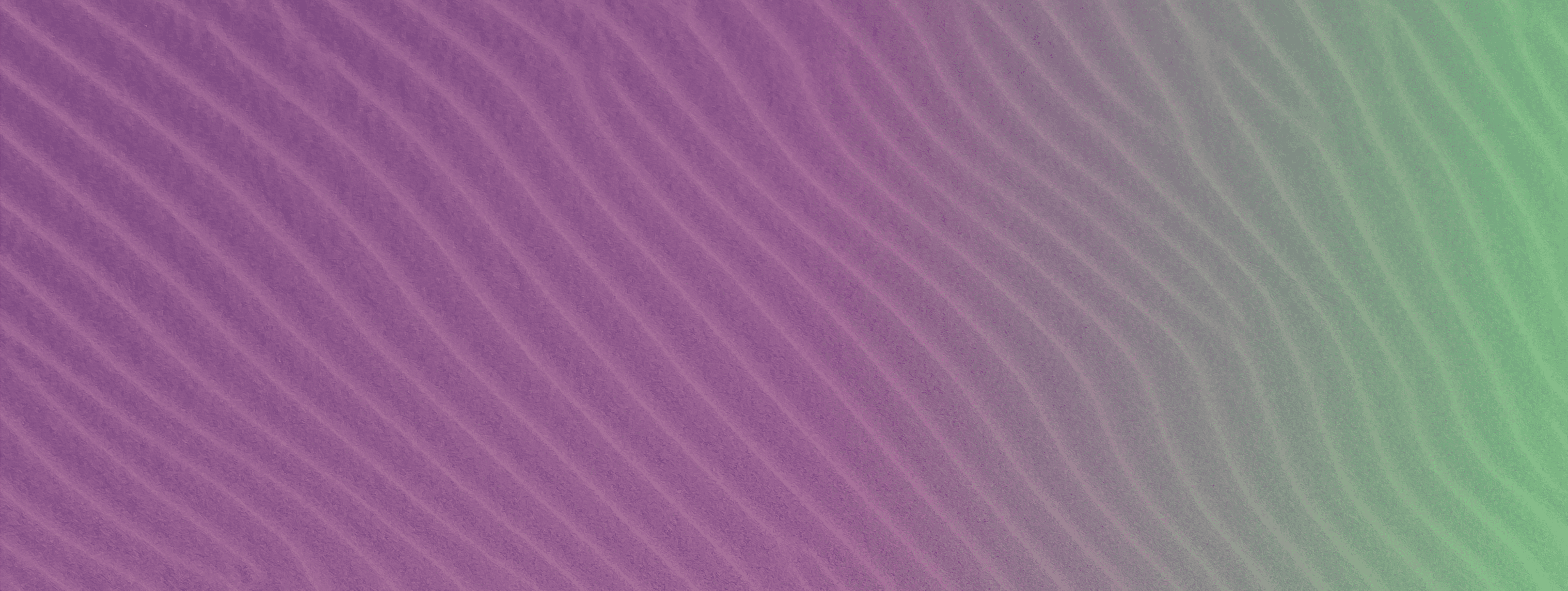 Golden sand dunes with particles of sand rising from the center