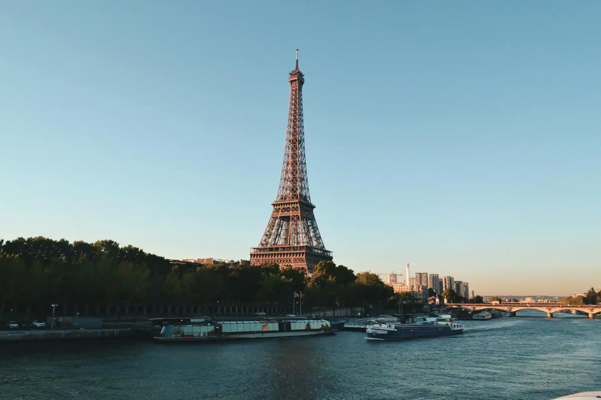 the eiffel tower is reflected in the water