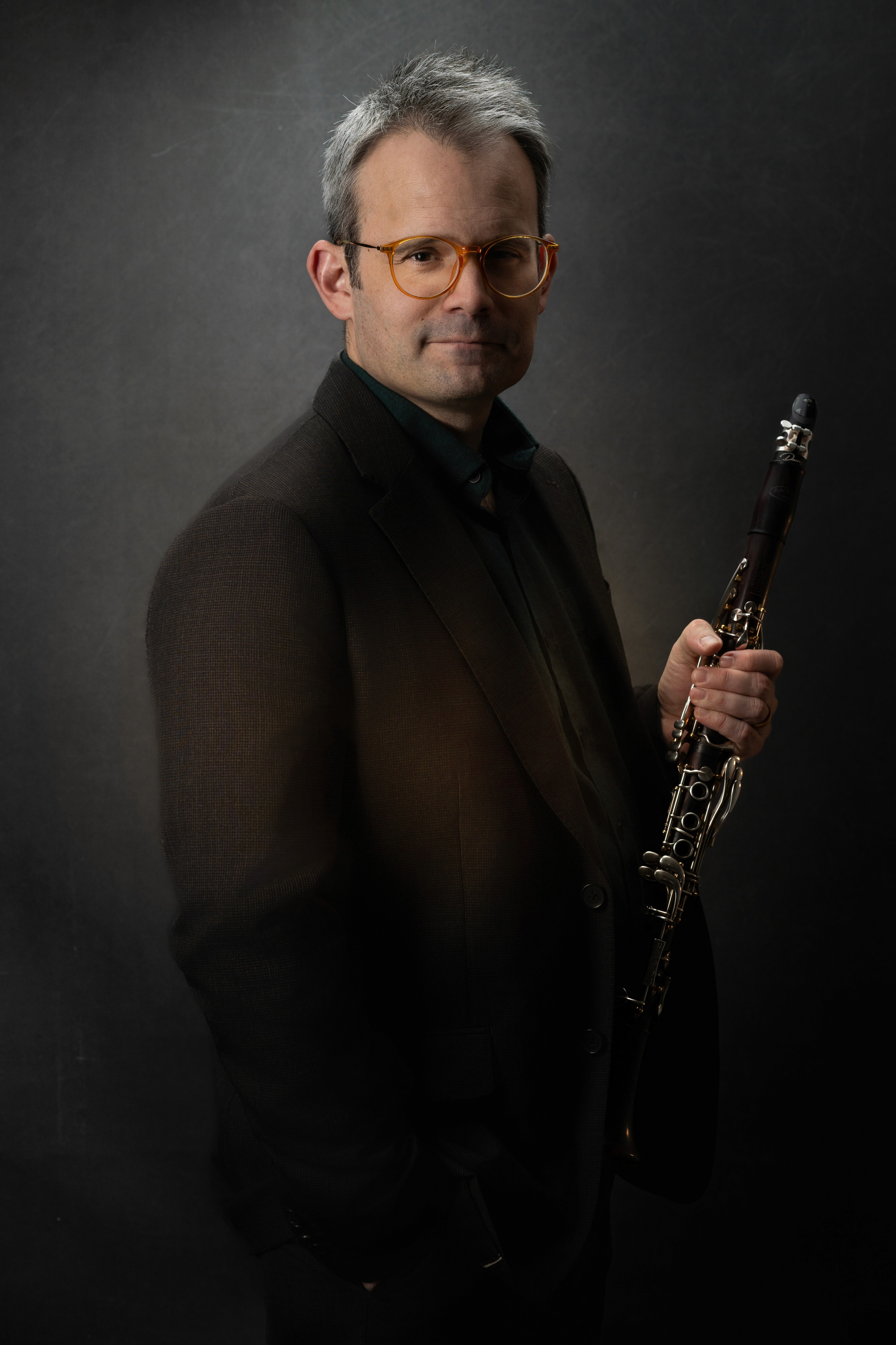 James Shields holding clarinet