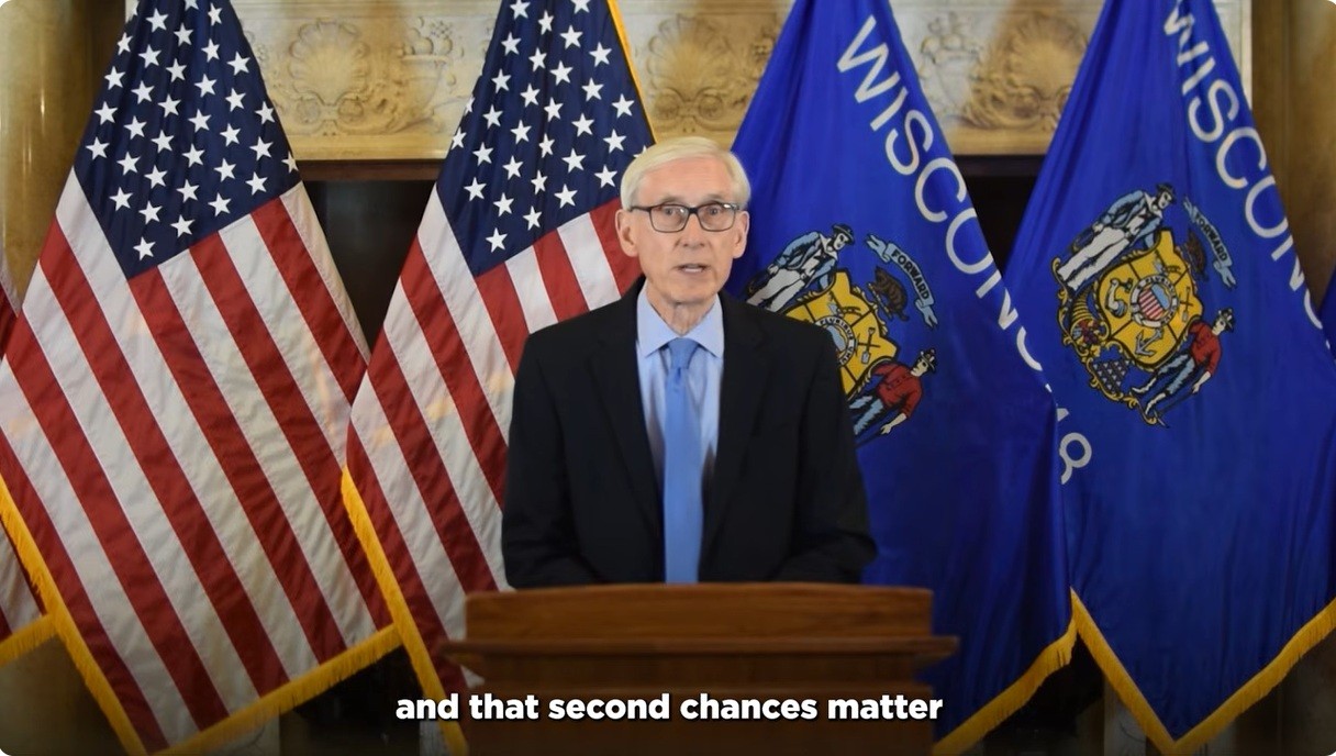 Gov. Tony Evers signed two executive orders Friday, reinstating commutations for prisoners who meet certain qualifications. He announced the orders in a video. (Screenshot/Governor’s office YouTube channel)