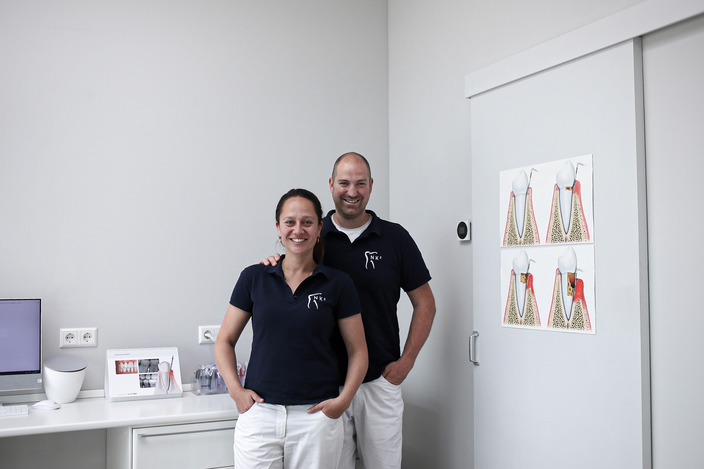 An orange cube-shaped side table is shown.