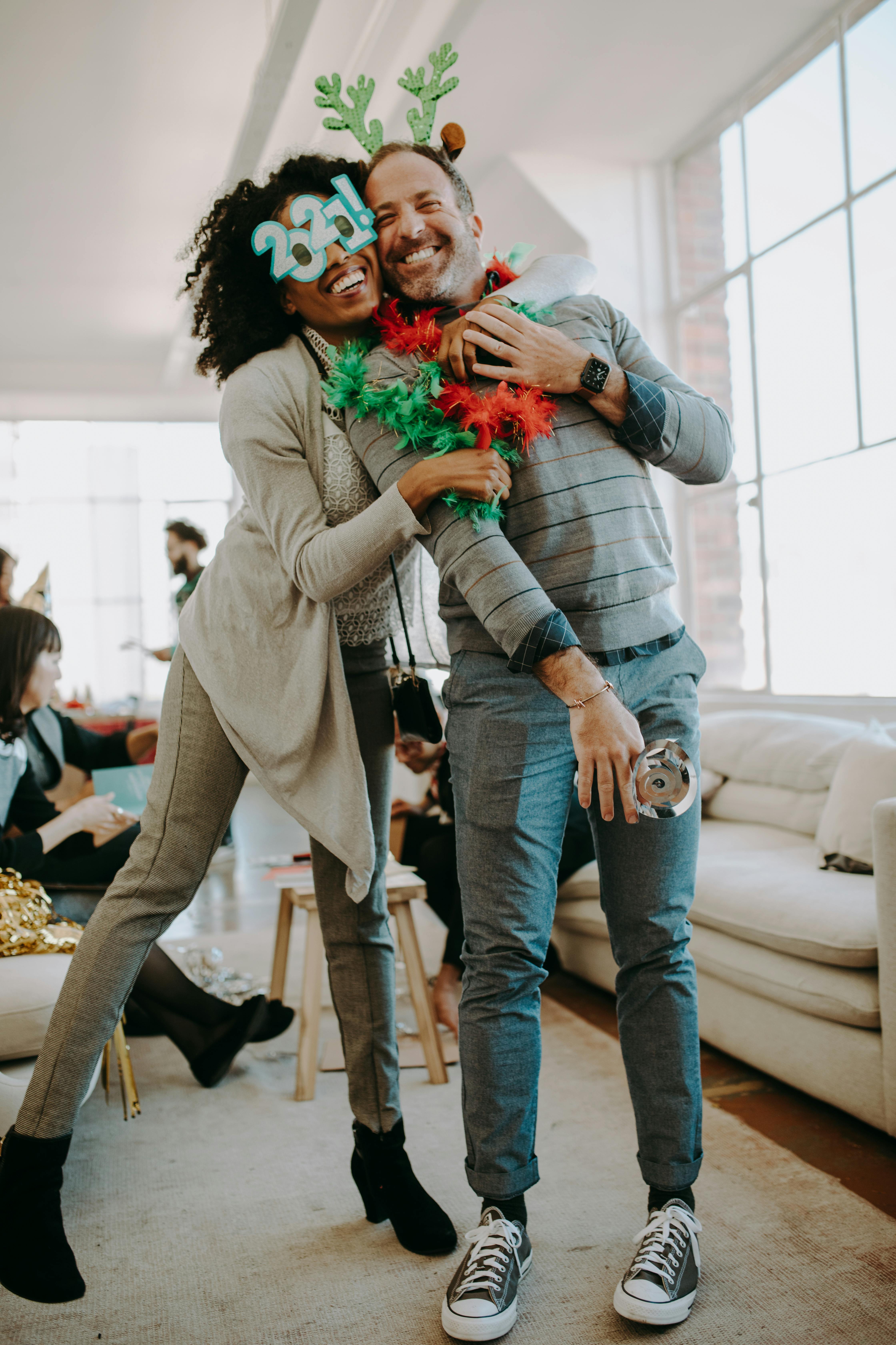 cheerful-colleagues-celebrating-in-office-with-holiday-decorations-and-joyful-at - rdne-stock-project (pexels)