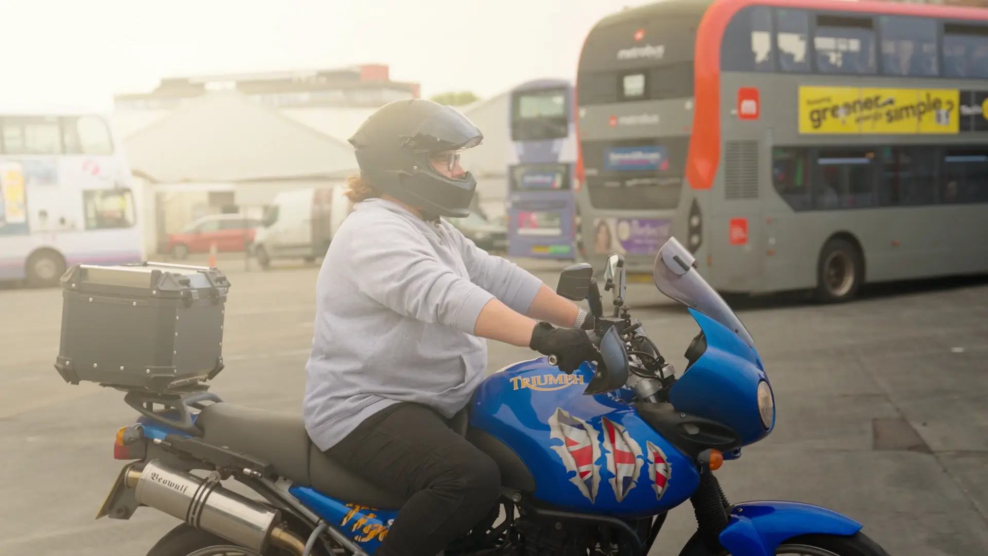 Group of presenters speaking on camera during a Microsoft live broadcast, filmed against branded event graphics.