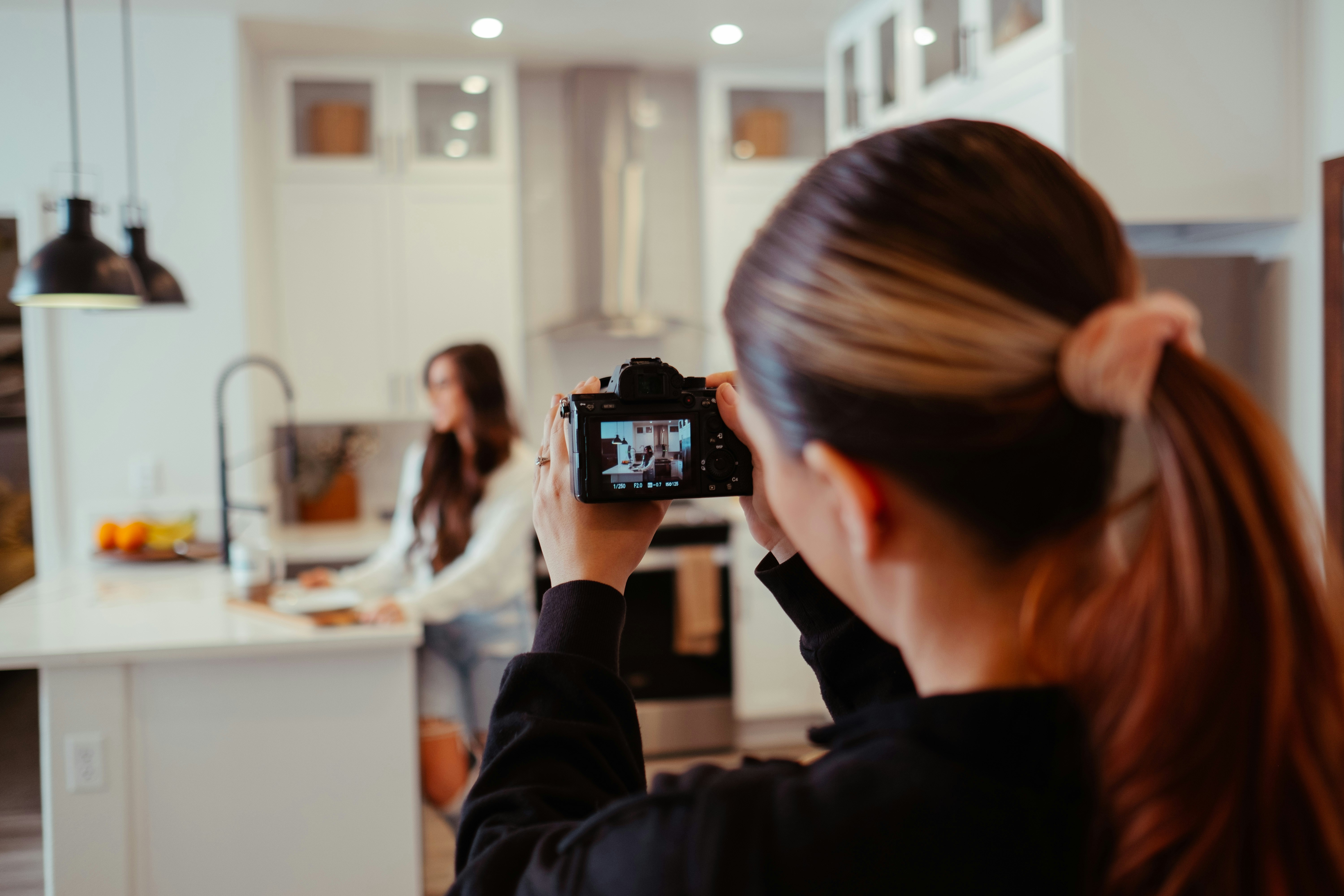 A lady Filming -  How To Edit A YouTube Video That Is Not Yours