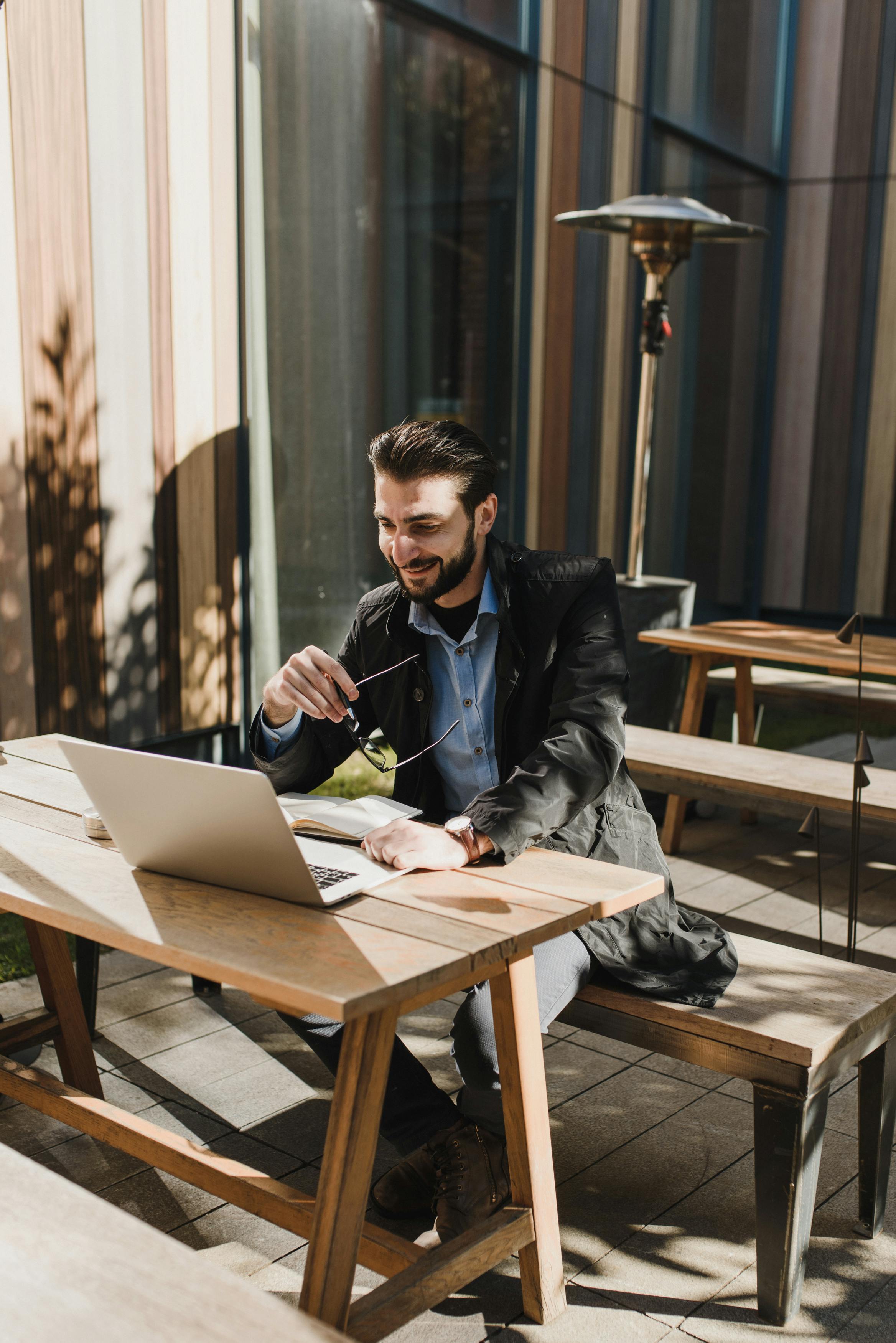 Smiling business man outside