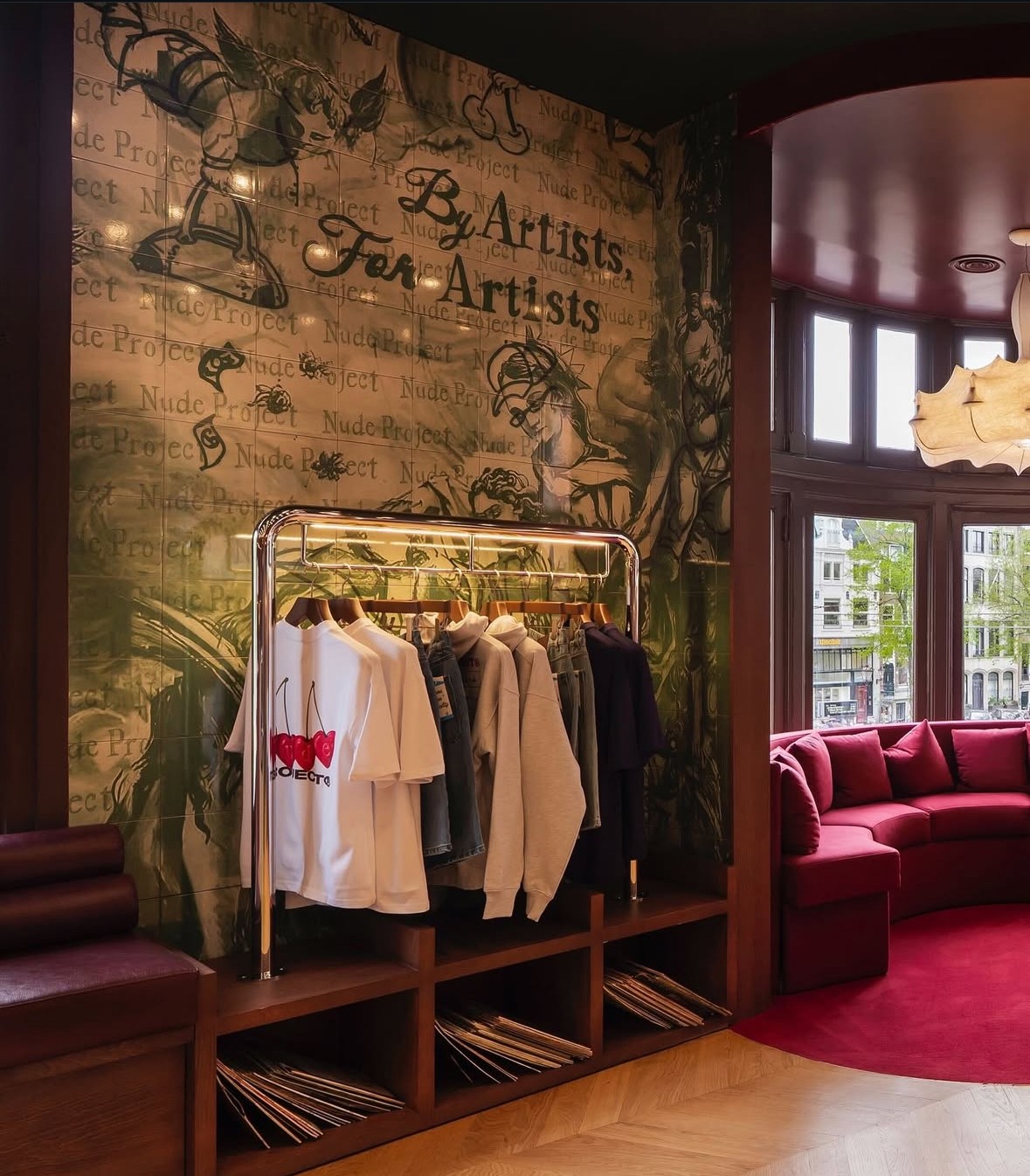 Streetside billboard with flyposters of the Batch.Works brand and illustrations