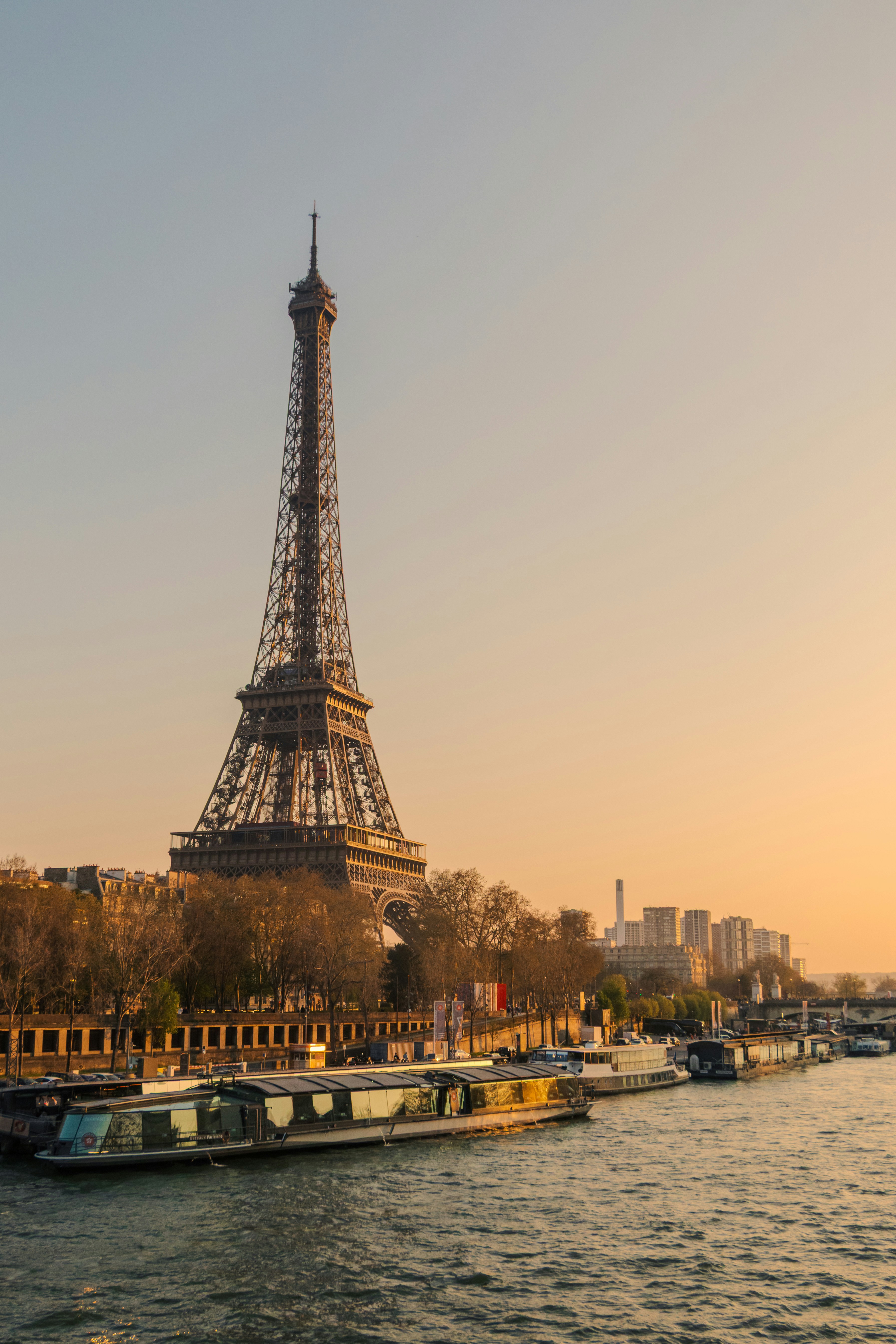 Eiffel tower and seine river at sunset