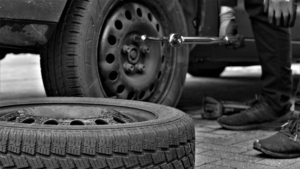 Car tires being changed