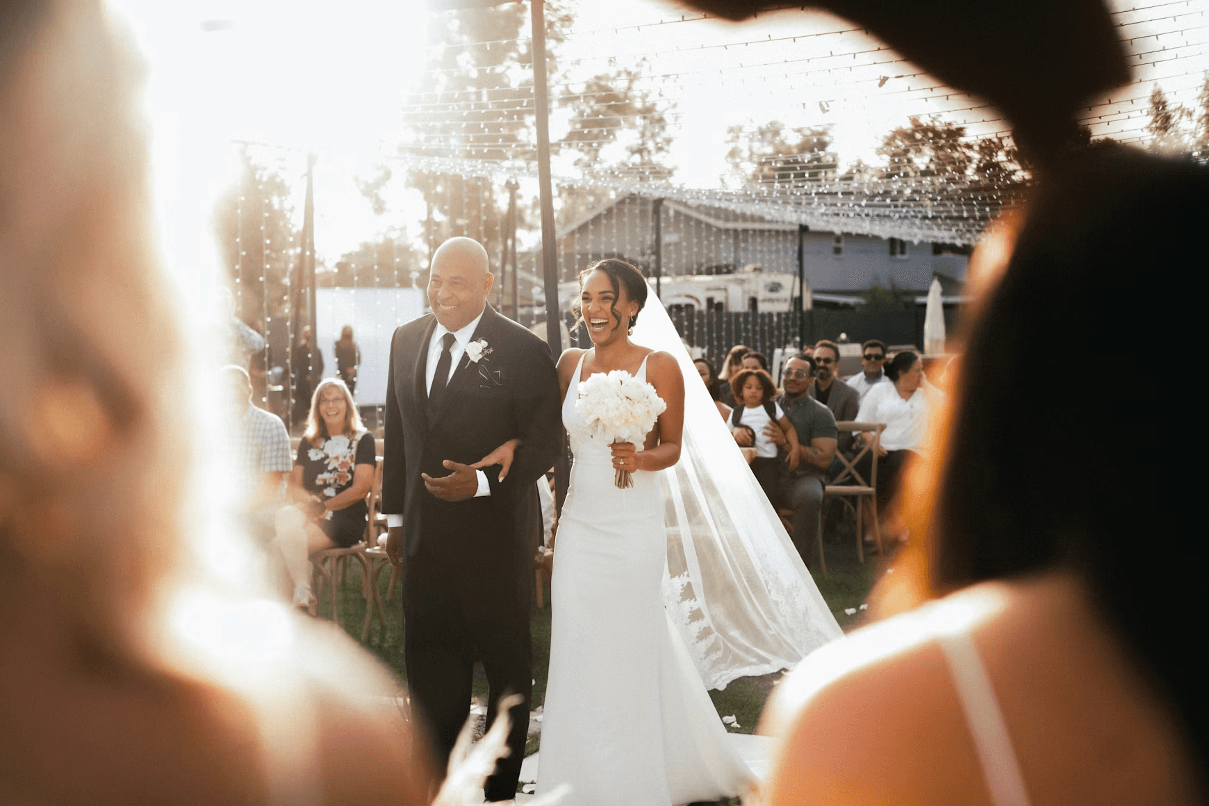 bride and groom standing on the street during daytime