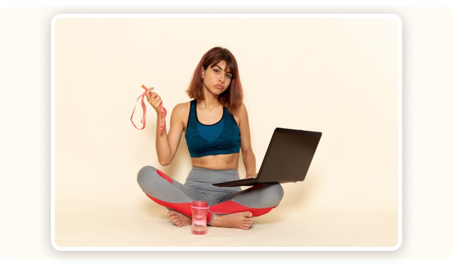 Woman holding a measuring tape