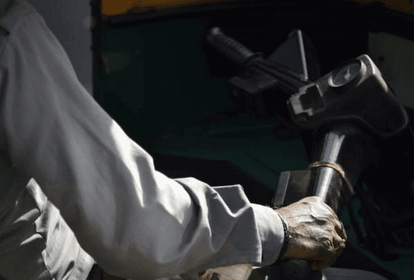 a cocktail glass with a cherry