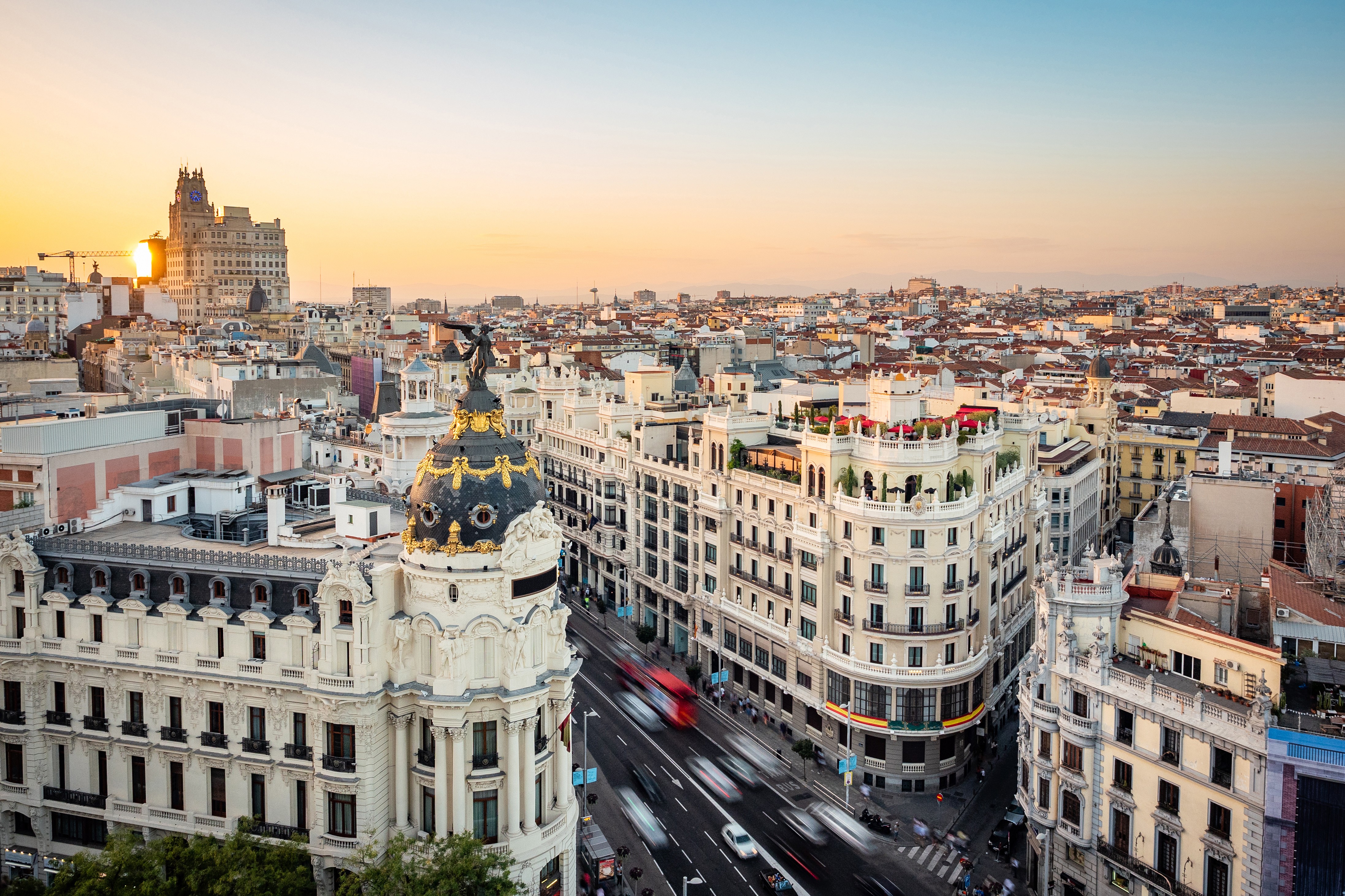 A view of Gran Via in Madrid at the golden hour