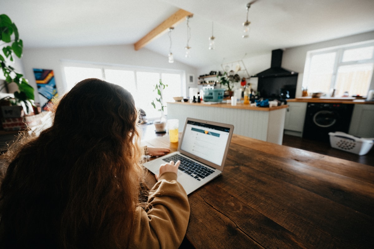 Planning a trip on a laptop at home