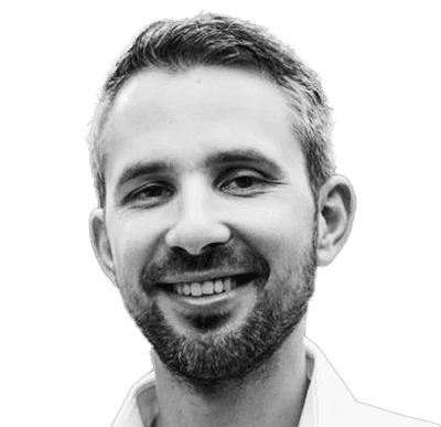 Black and white portait of a smiling man