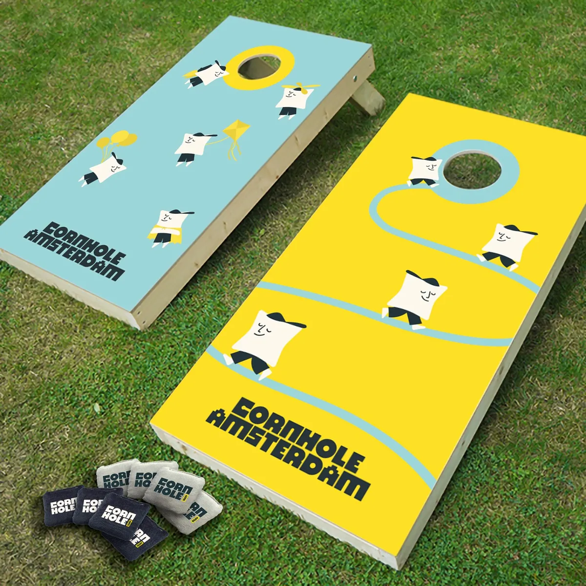 Close up of a cornhole board with a bean bag on grass