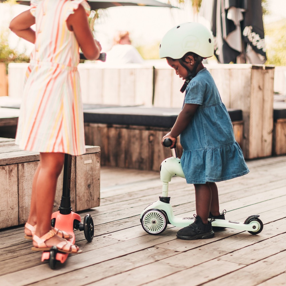 kids riding scooters