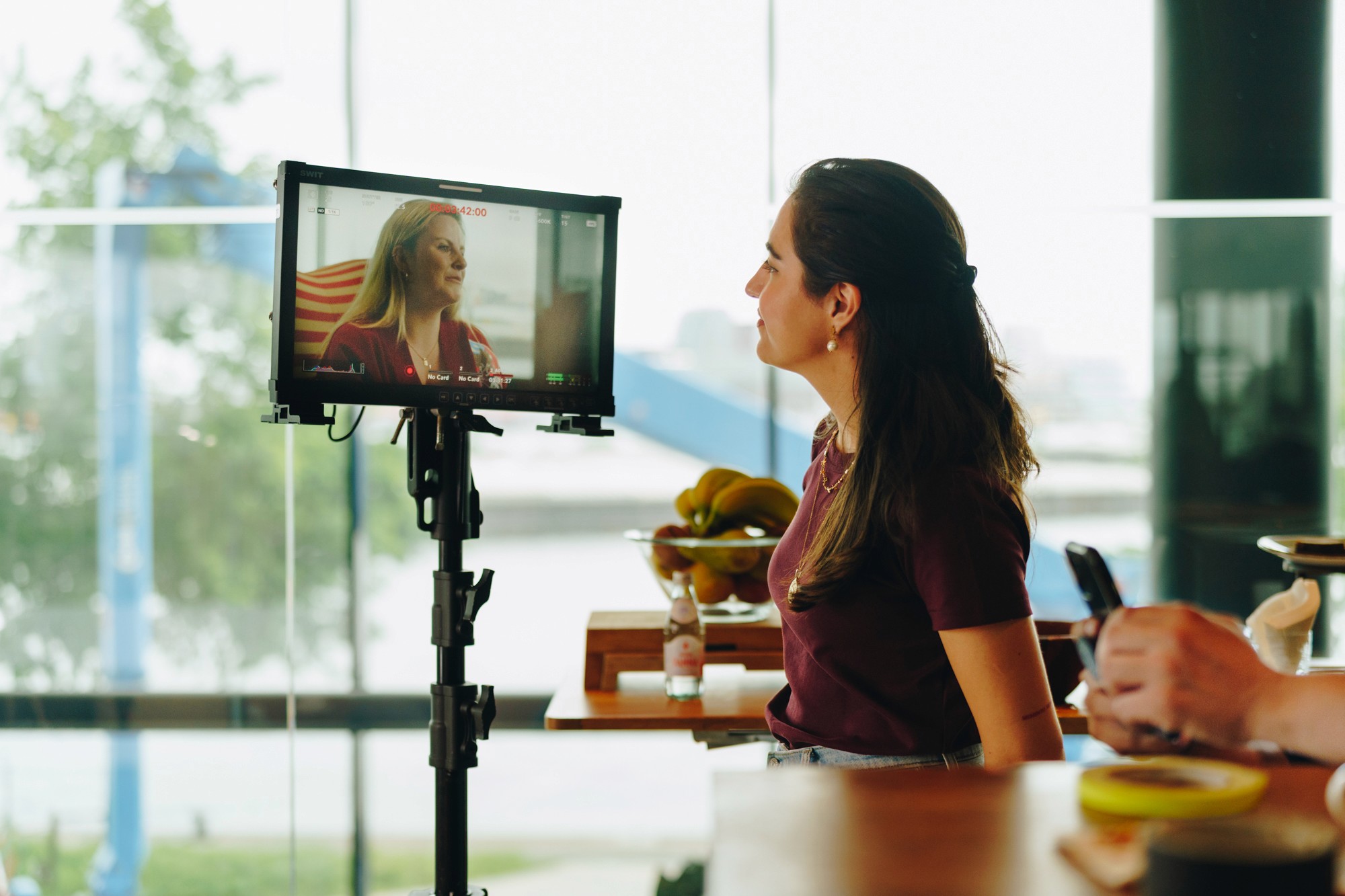 The image captures the ethereal beauty of an underwater cave illuminated by sunbeams penetrating through an opening above.