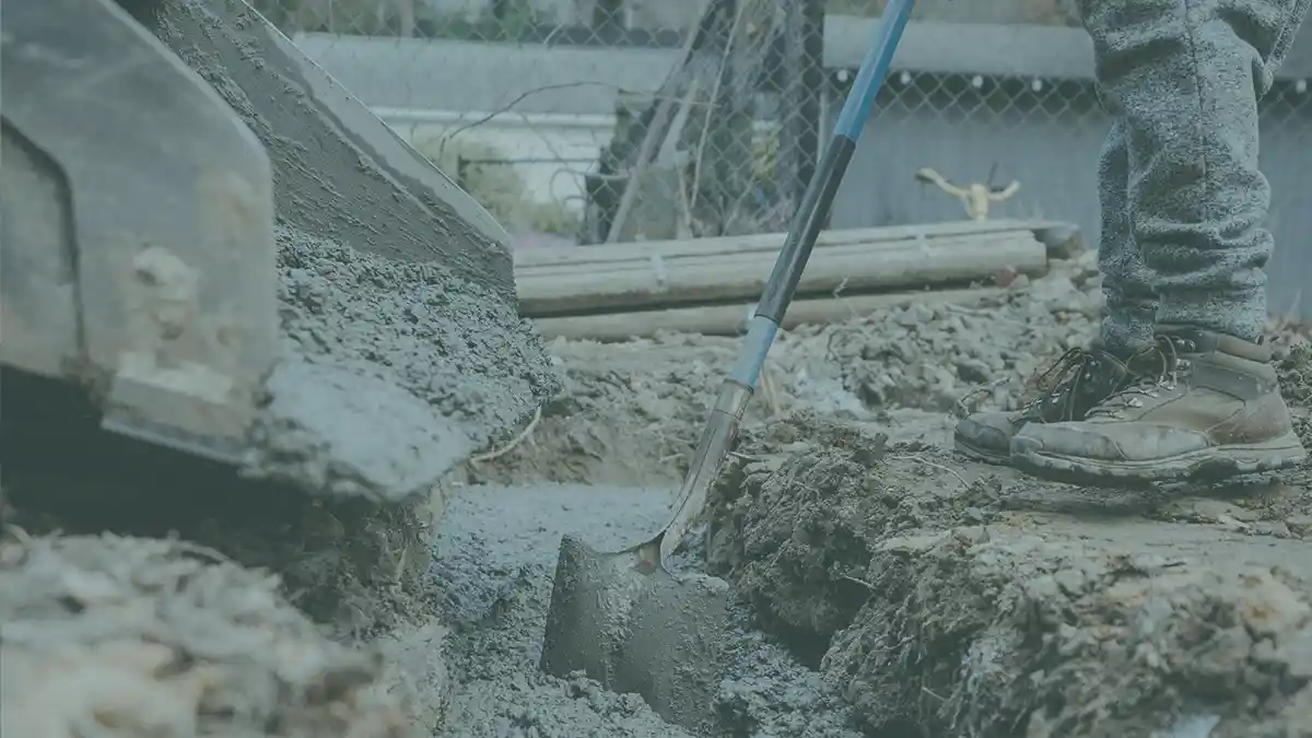A man pouring concrete