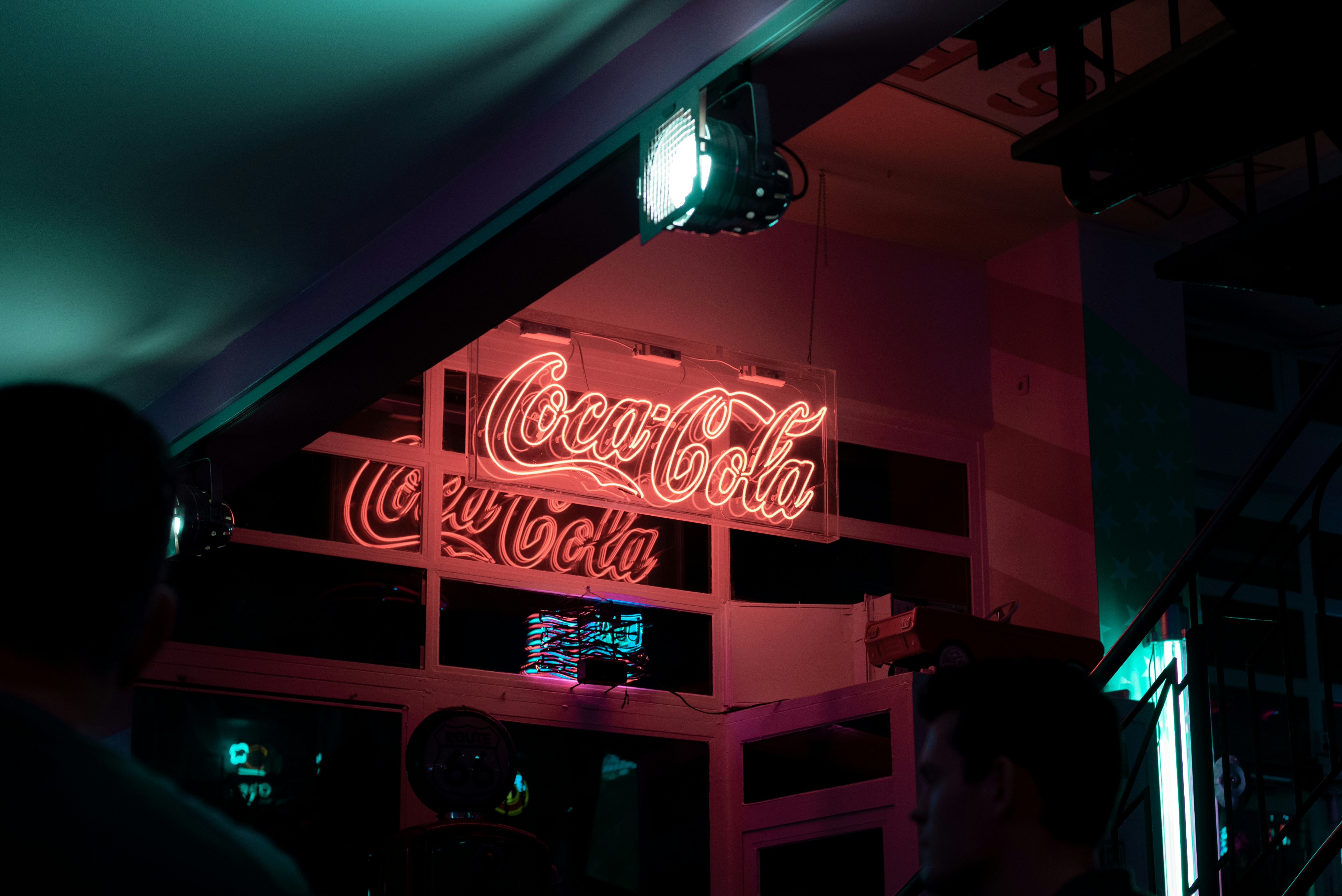 red and white love me neon light signage