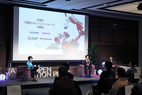 Picture taken of a speaker at the Japan Open Innovation Prize Ceremony