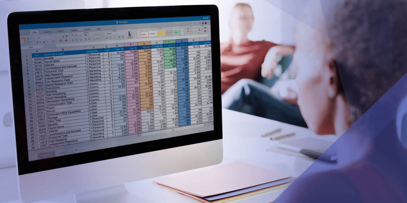 Woman looking at excel sheets - How to Remove Duplicates in Google Sheets