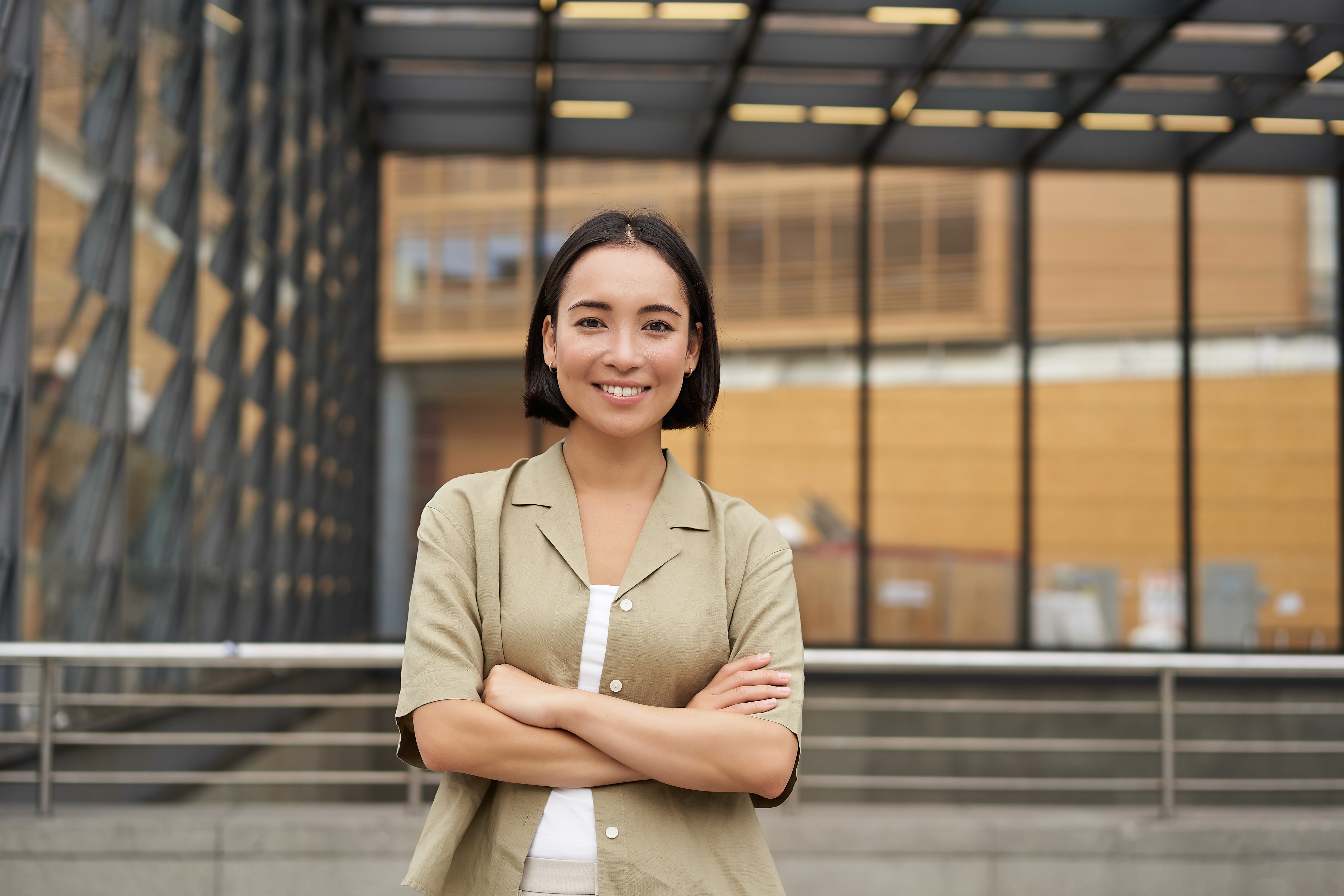 woman in black blazer smiling