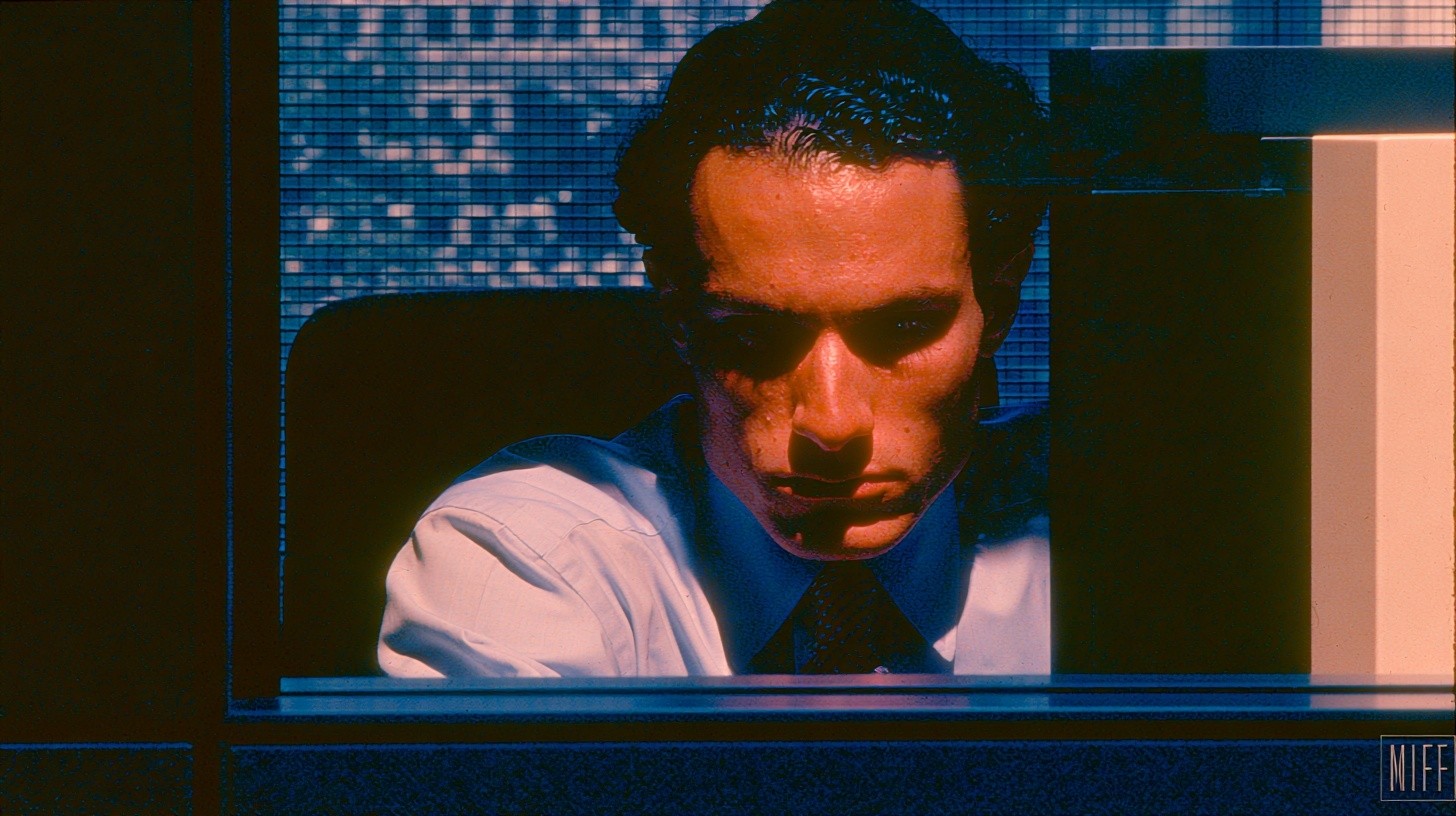 A compliance operations specialist verifies a customer's phone, email, and SMS contact permissions before outreach, reviewing channel consent records on a secure banking workstation