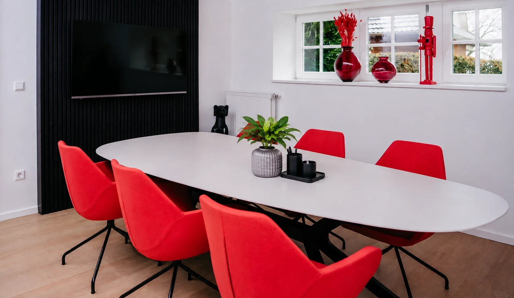 photo of dining table and chairs inside room