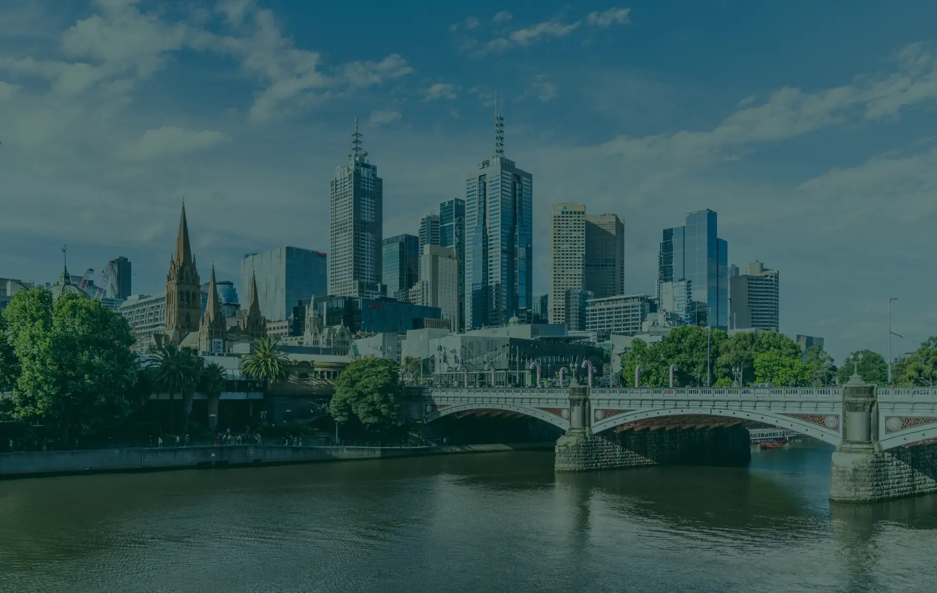 City skyline with bridge and river