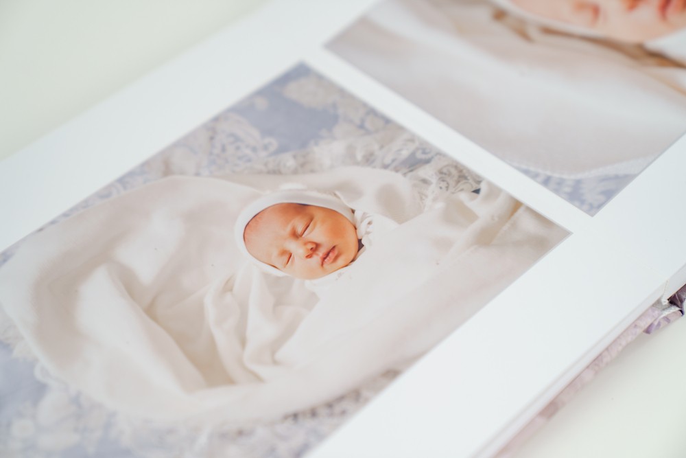 Photo strip showing a series of newborn hospital photos.