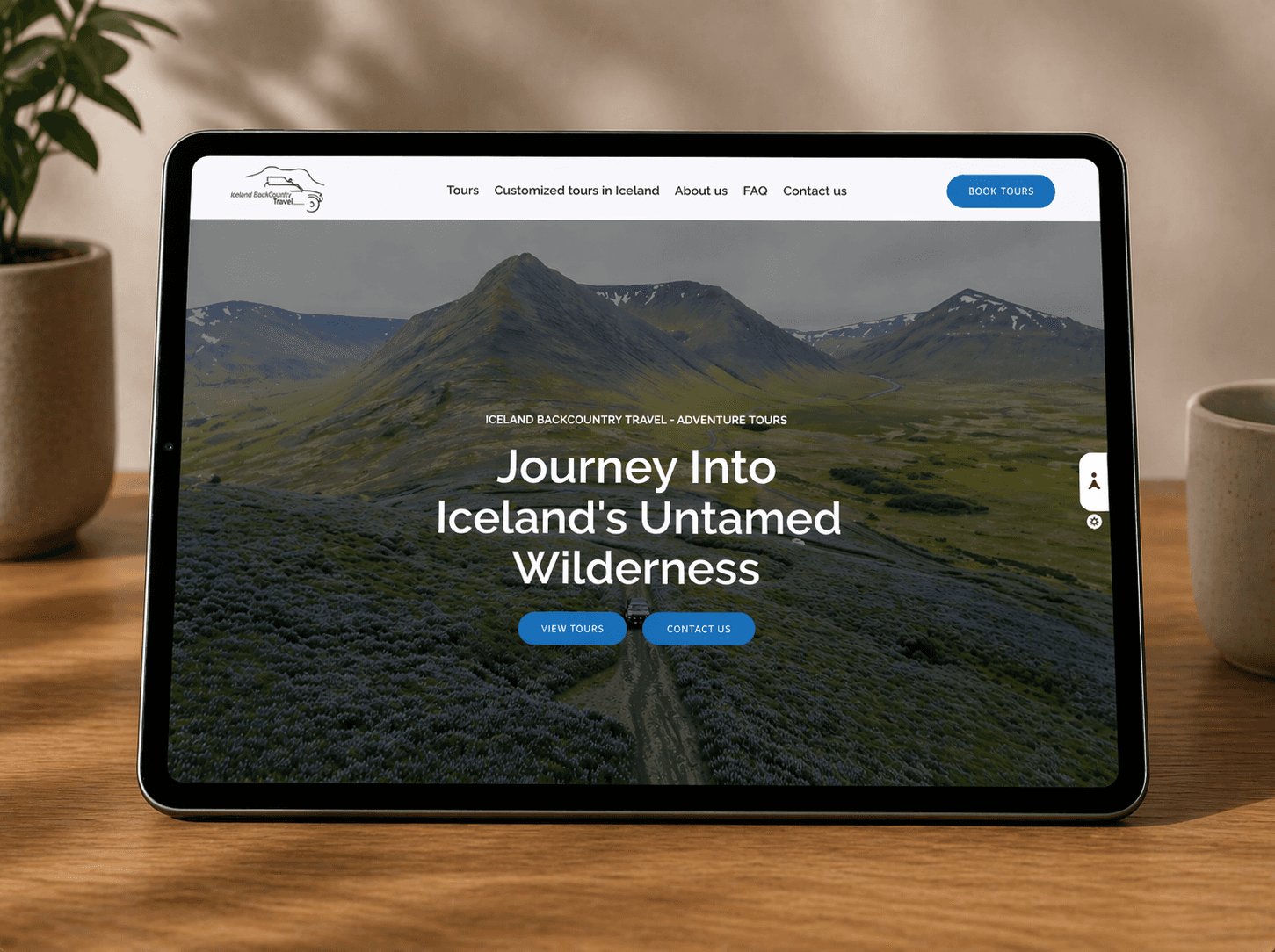 A laptop and phone showing ibctravel.is