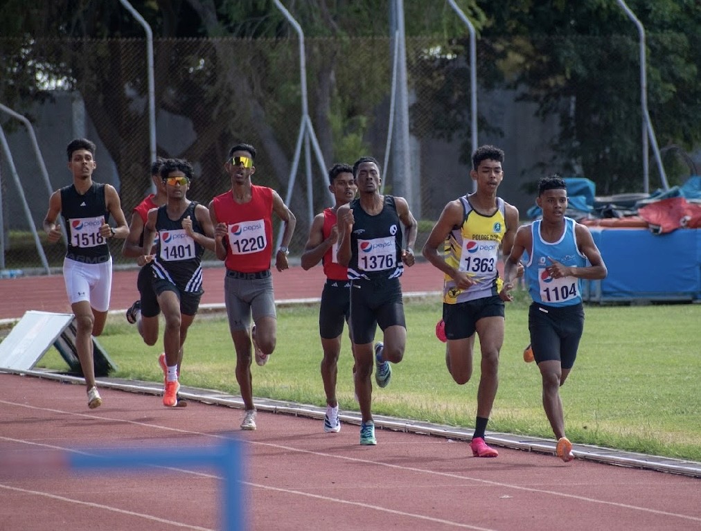 A runner with a blue sky in the background