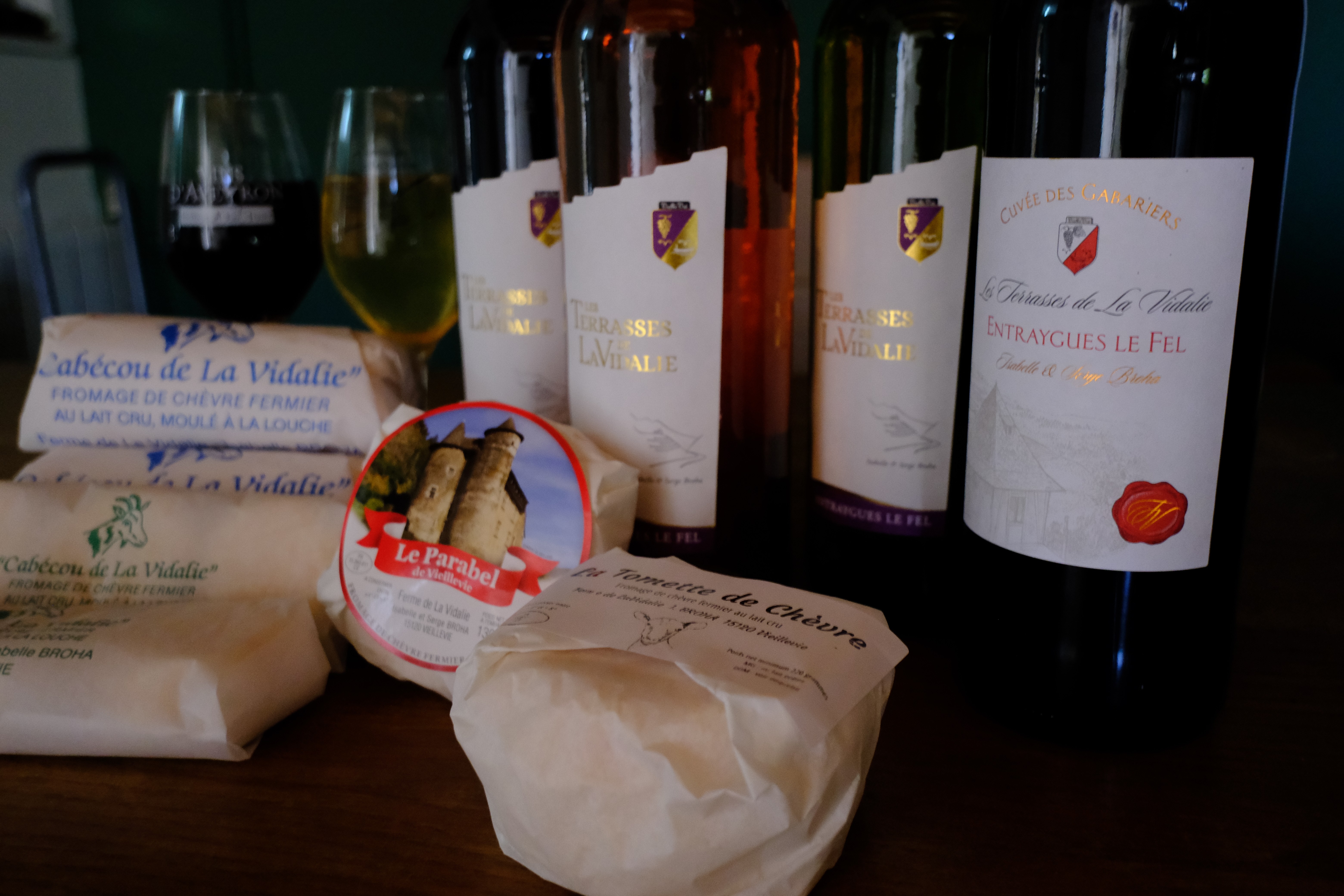 Wine, cheese and bread on a towel