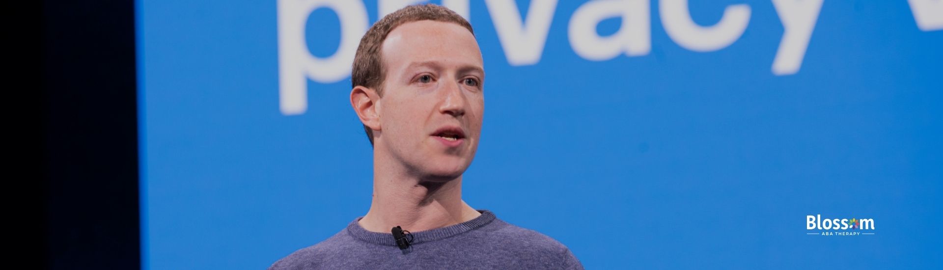 Mark Zuckerberg speaking at a presentation with "privacy" in the background.