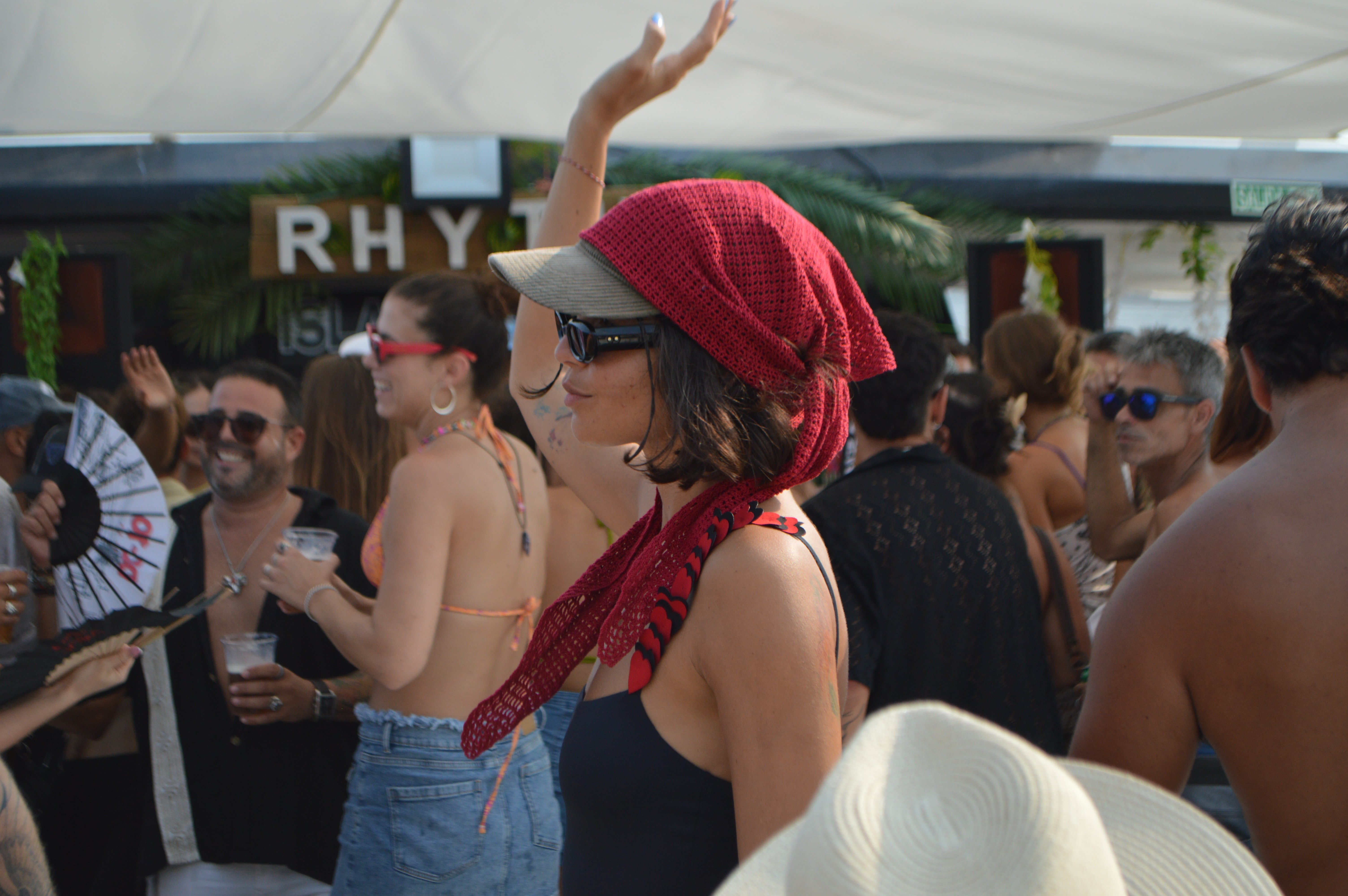 low-angle photography of two men playing beside two women