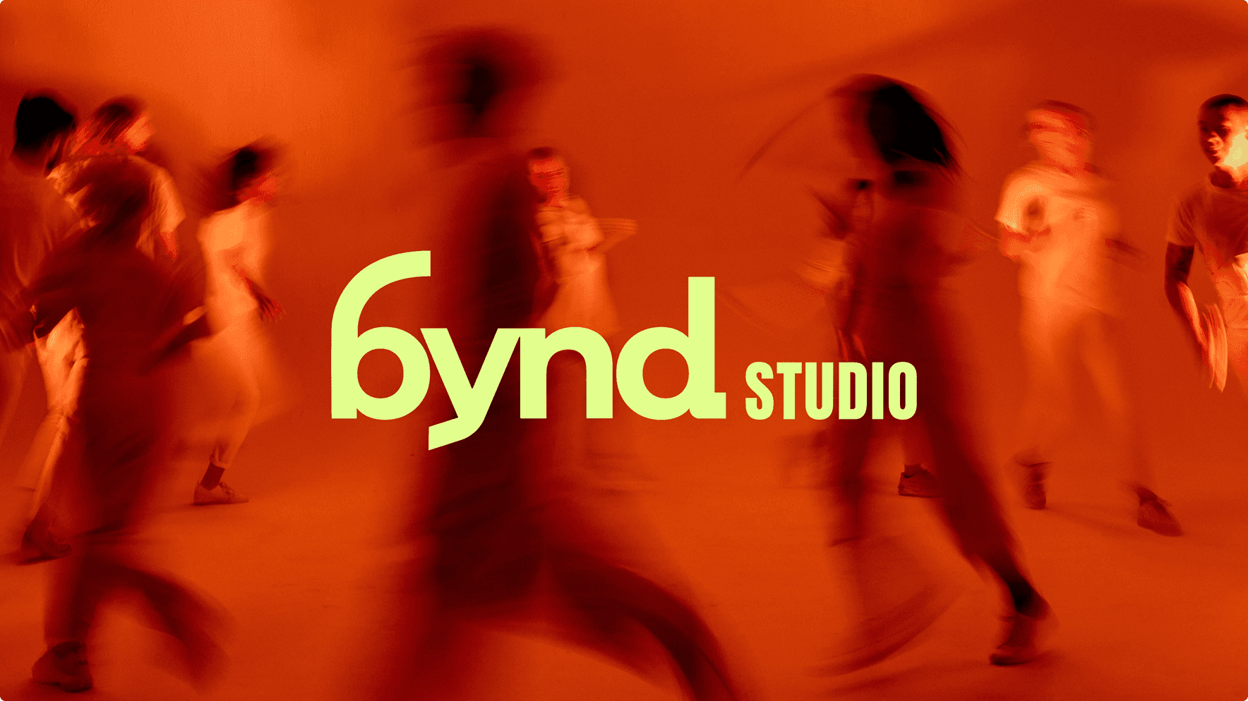 bynd studio logo over orange motion blur photo of people running