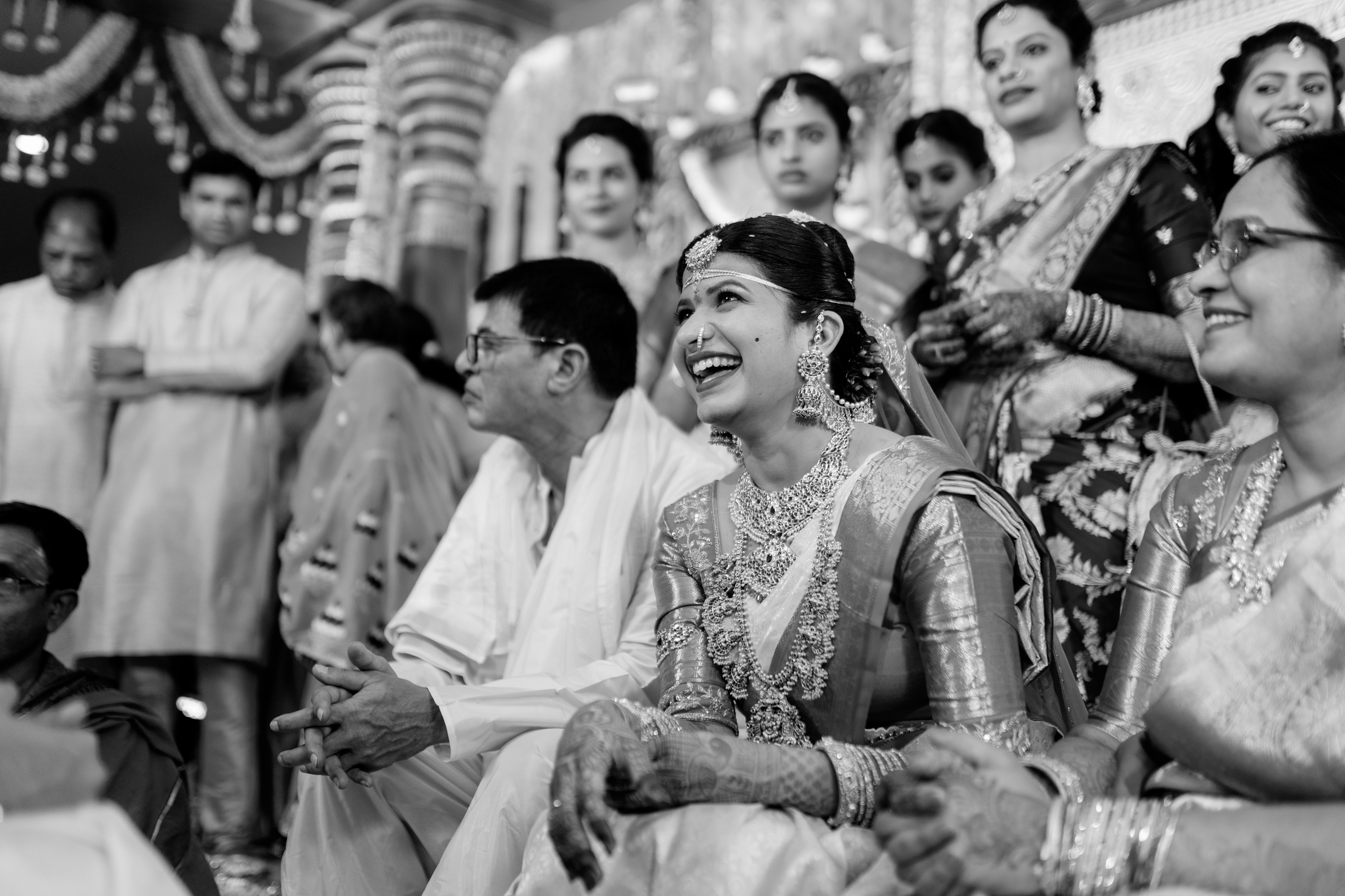 Mounika radiates love and happiness in a classic black & white portrait. Photo by Out of The Blues Fine Art Wedding Photography in Hyderabad.