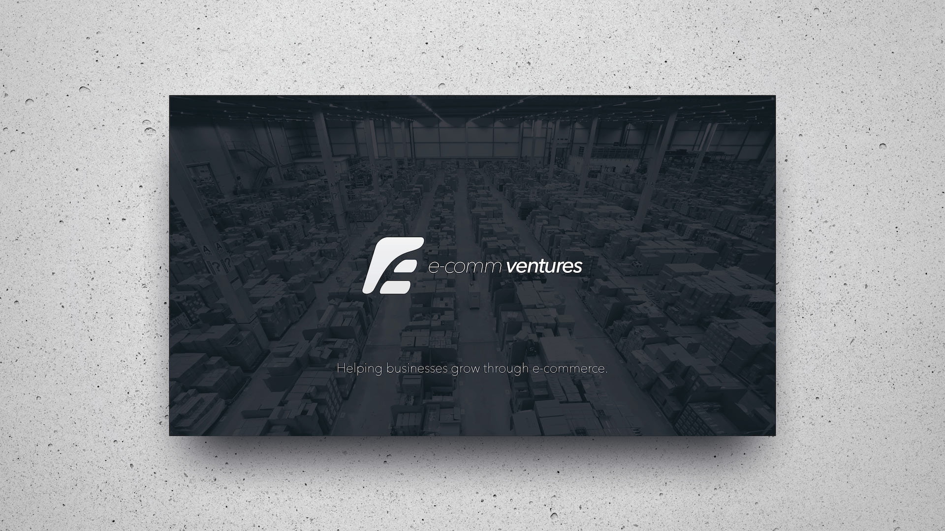 E-Comm Ventures title slide with company logo and tagline "Helping businesses grow through e-commerce" overlaid on dark warehouse distribution center background, featuring white modern logomark design for B2B e-commerce consulting presentation.