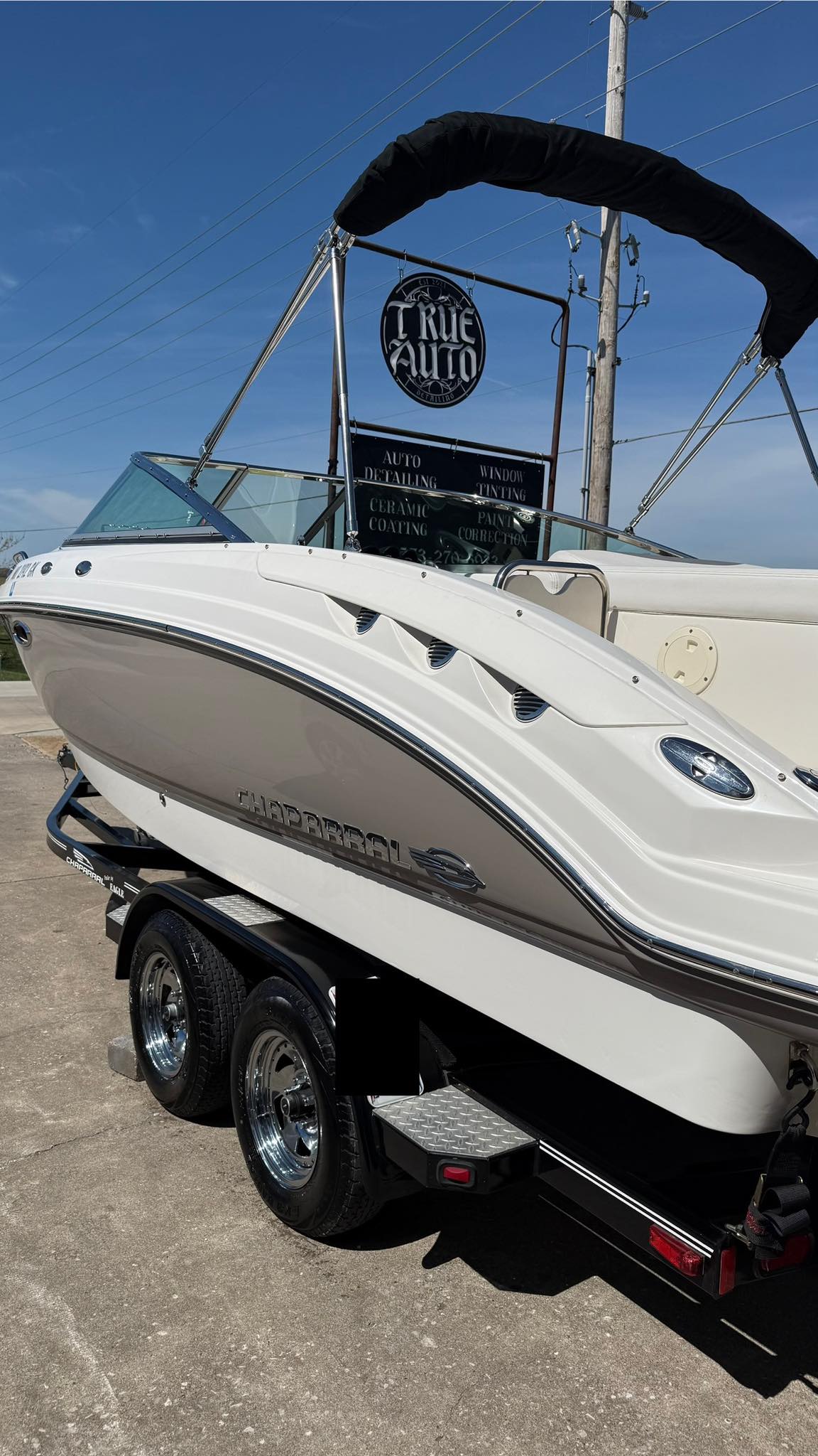 Grey and white boat after getting a detail