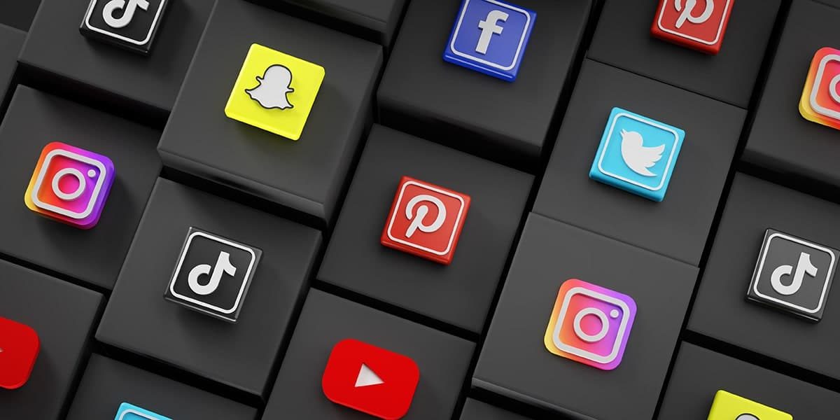 Two Men Using Laptop