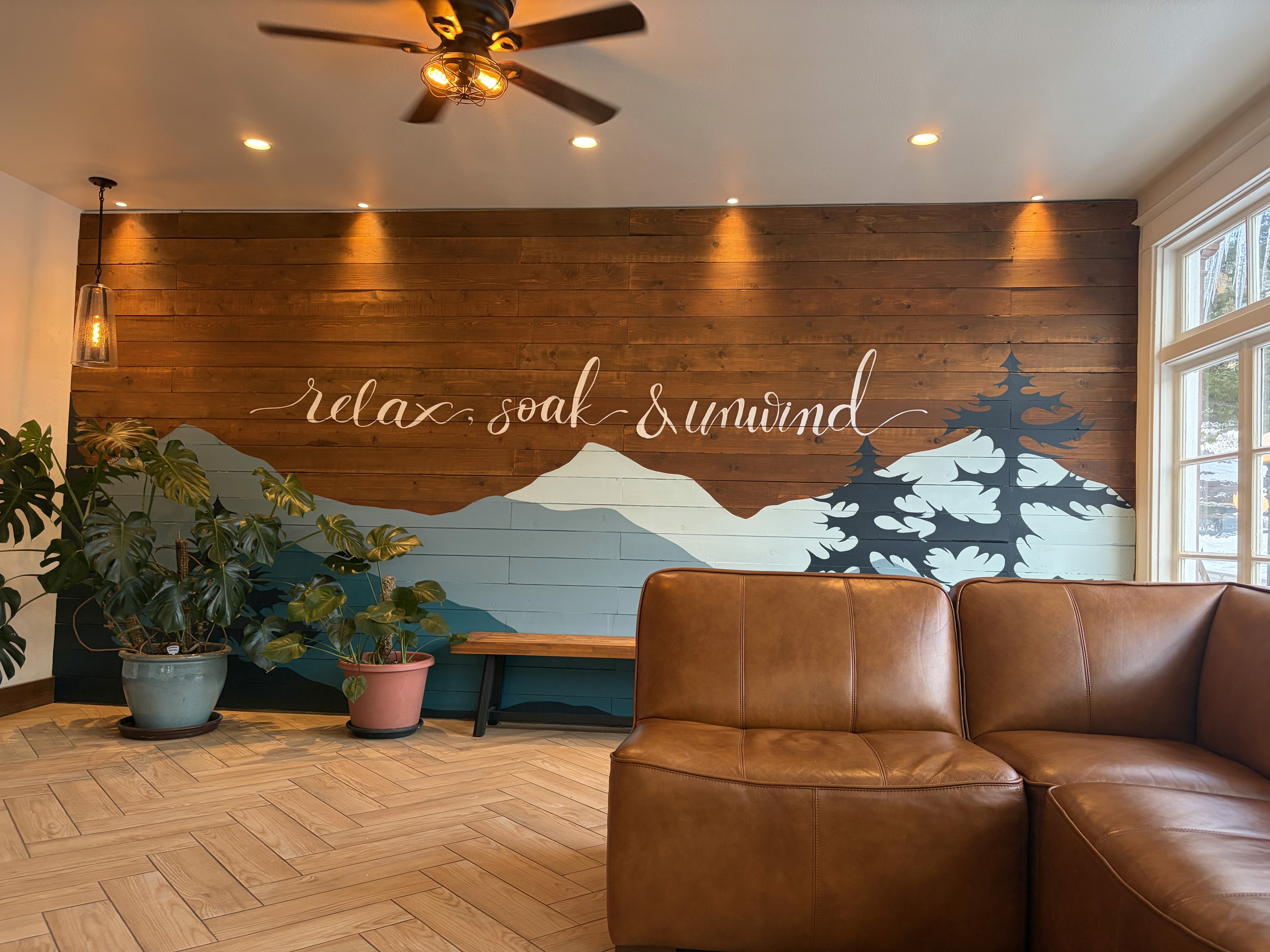 spa with words "relax, soak and unwind"