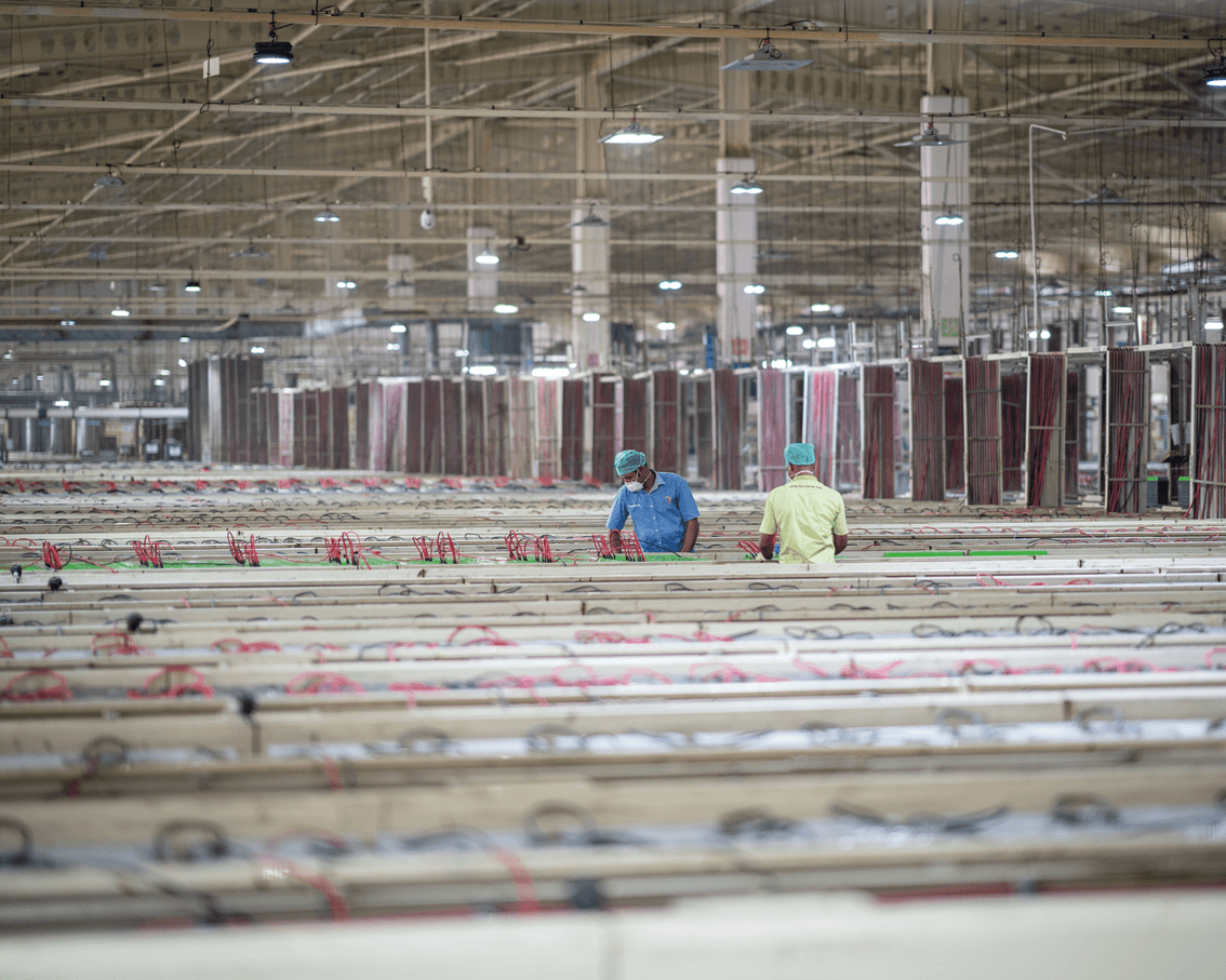 Detailed close-up of an automated manufacturing process in action.