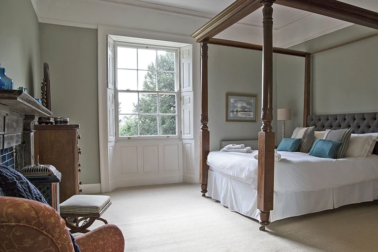 Hartingtons Heritage Tours hotel, Darley House, relaxing bedroom with four poster bed