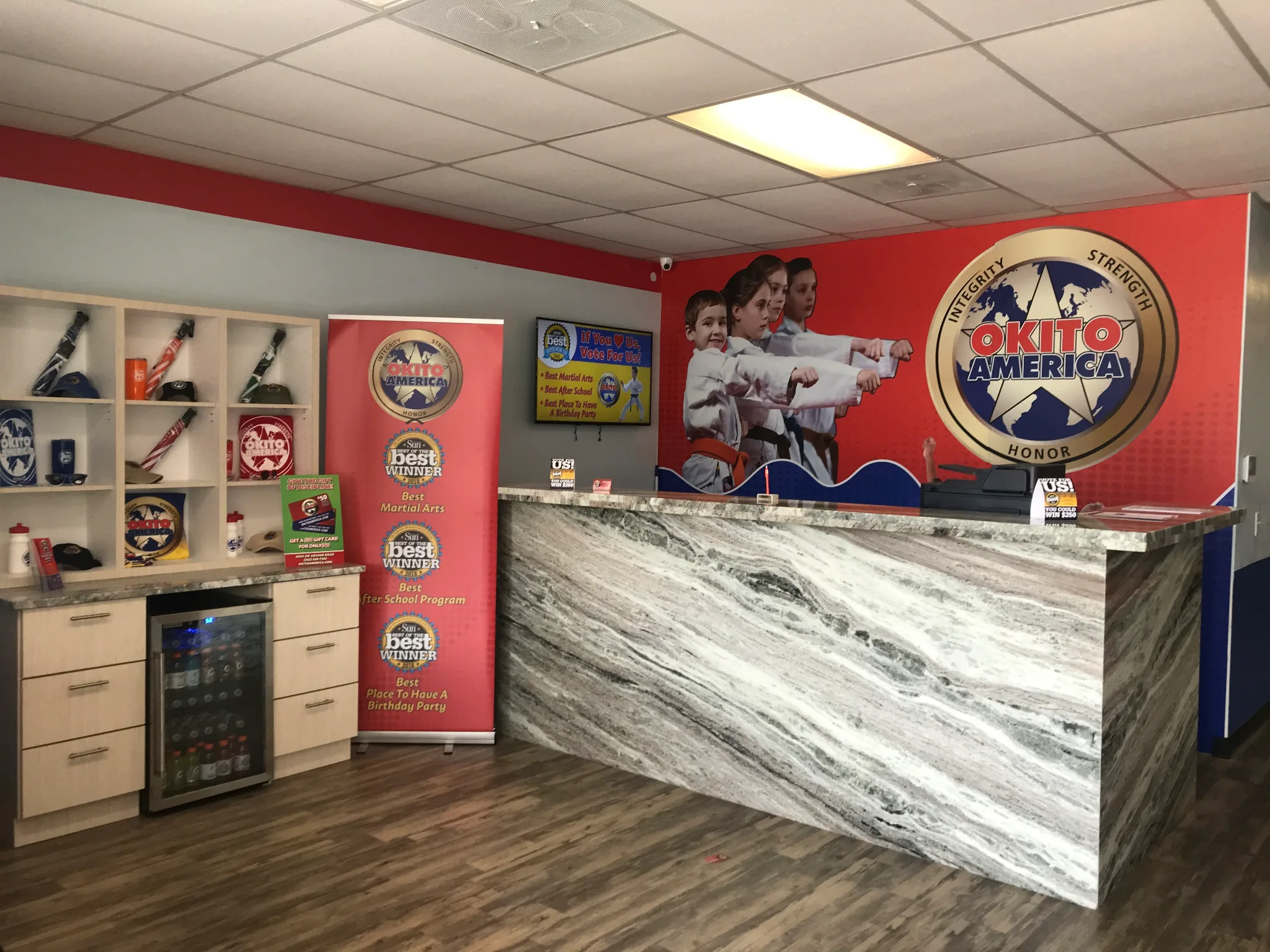 reception area at the Okito America Archer Road location, showcasing merchandise, branding, and a welcoming front desk.