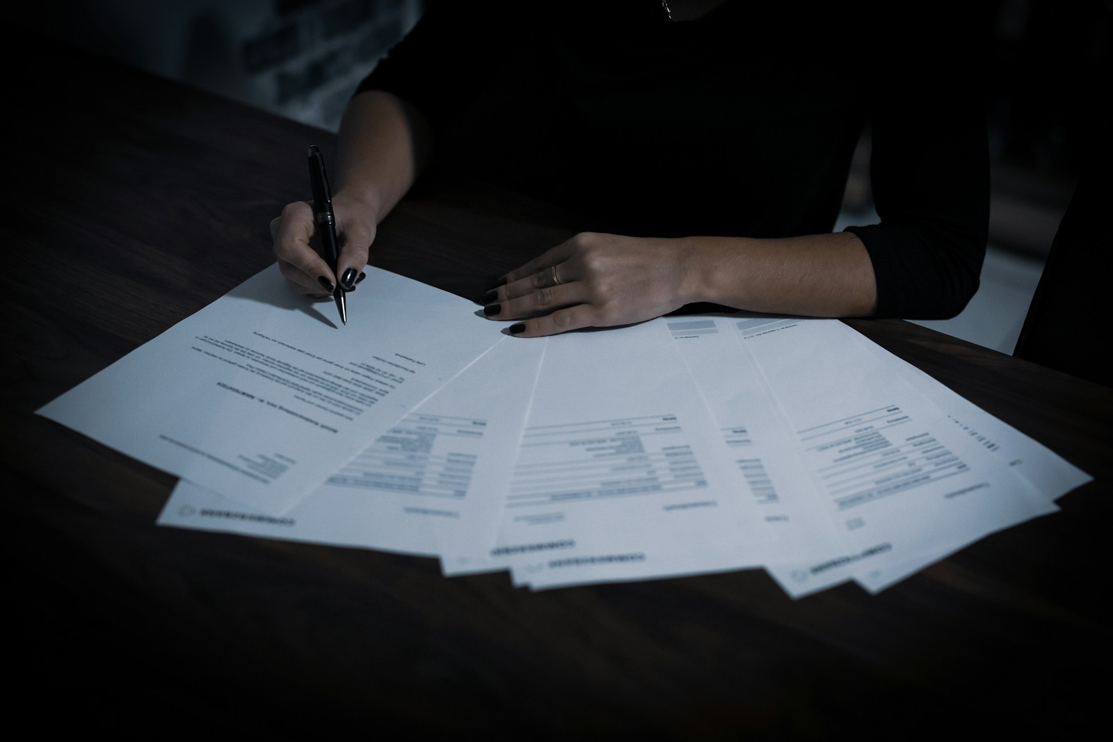 Revenue cycle analyst comparing an insurance remittance against a payer contract